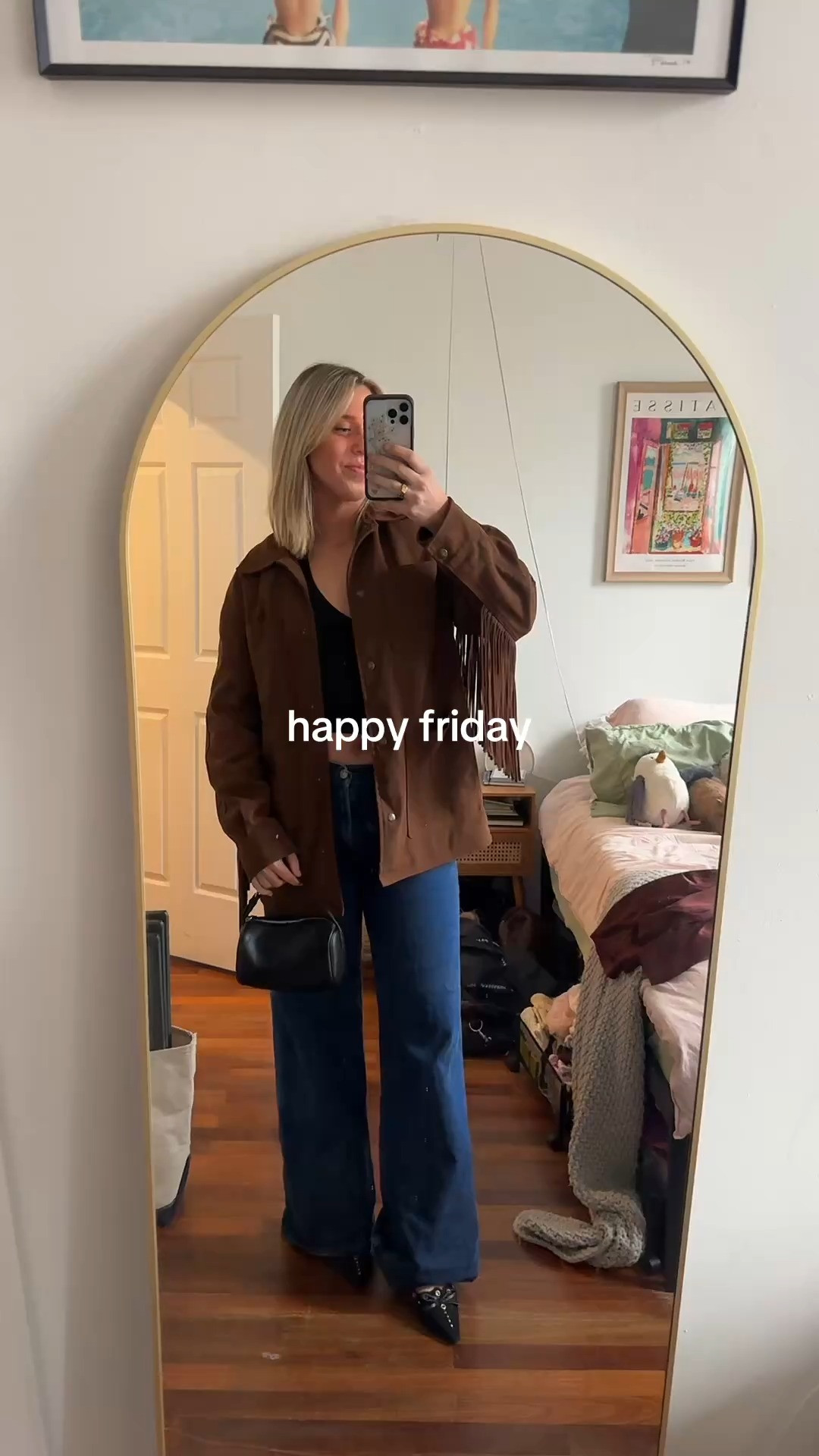 fringe suede brown jacket by levis with black halter top from amazon, low rise jeans from agolde, and black heels from amazon. perfect for nyc night out, or a country concert. very chic and functional!  

 #LTKFestival #LTKootd #LTKMidsize