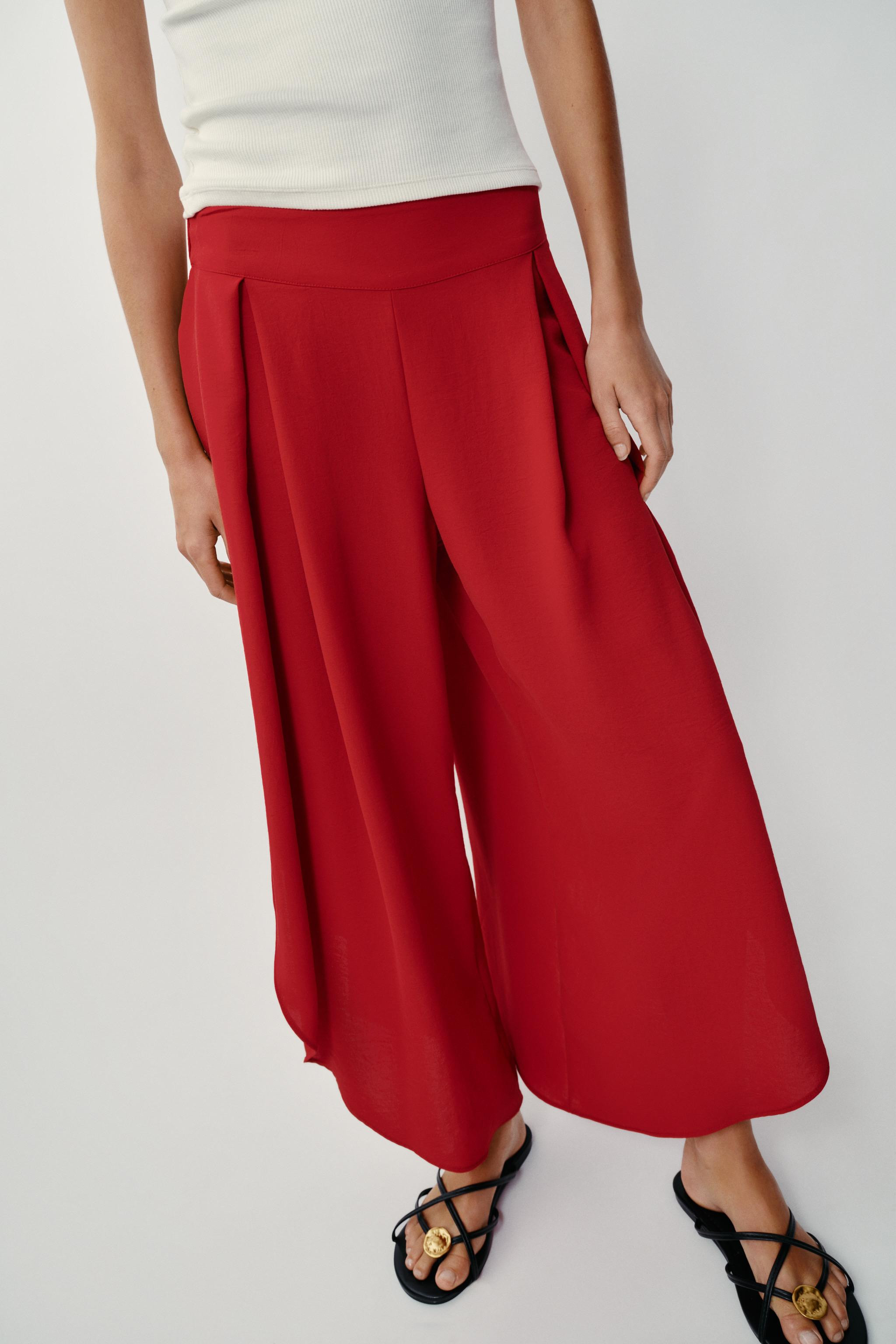 High-waisted pants with front pleats and elasticized back waistband. Wide, cropped leg with side ... | Zara US