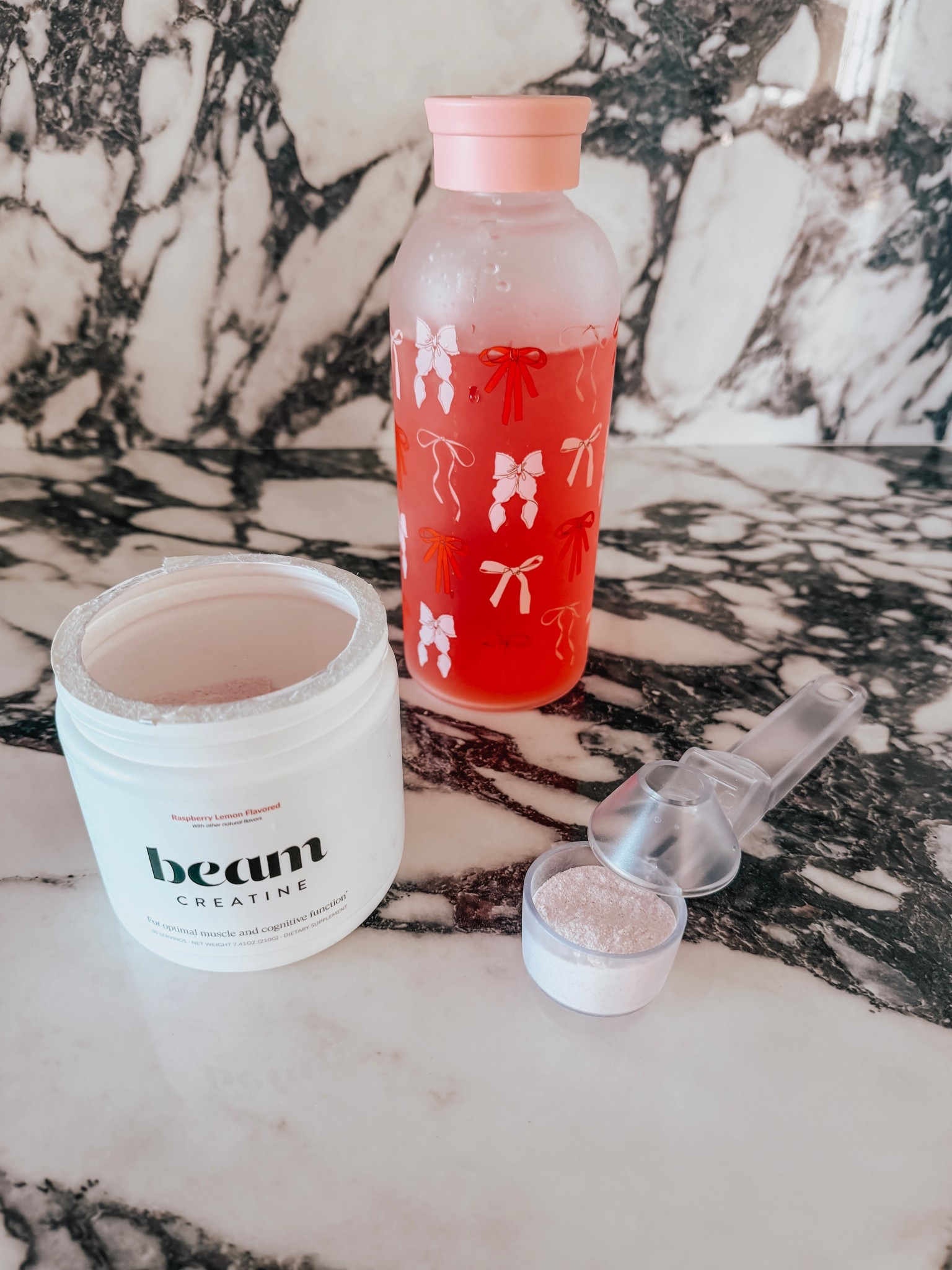 Upgrade your hydration game with this adorable pink bow water bottle and trusty coffee scoop funnel. Perfect for coffee lovers and gym goers alike. 

#LTKActive #LTKHome