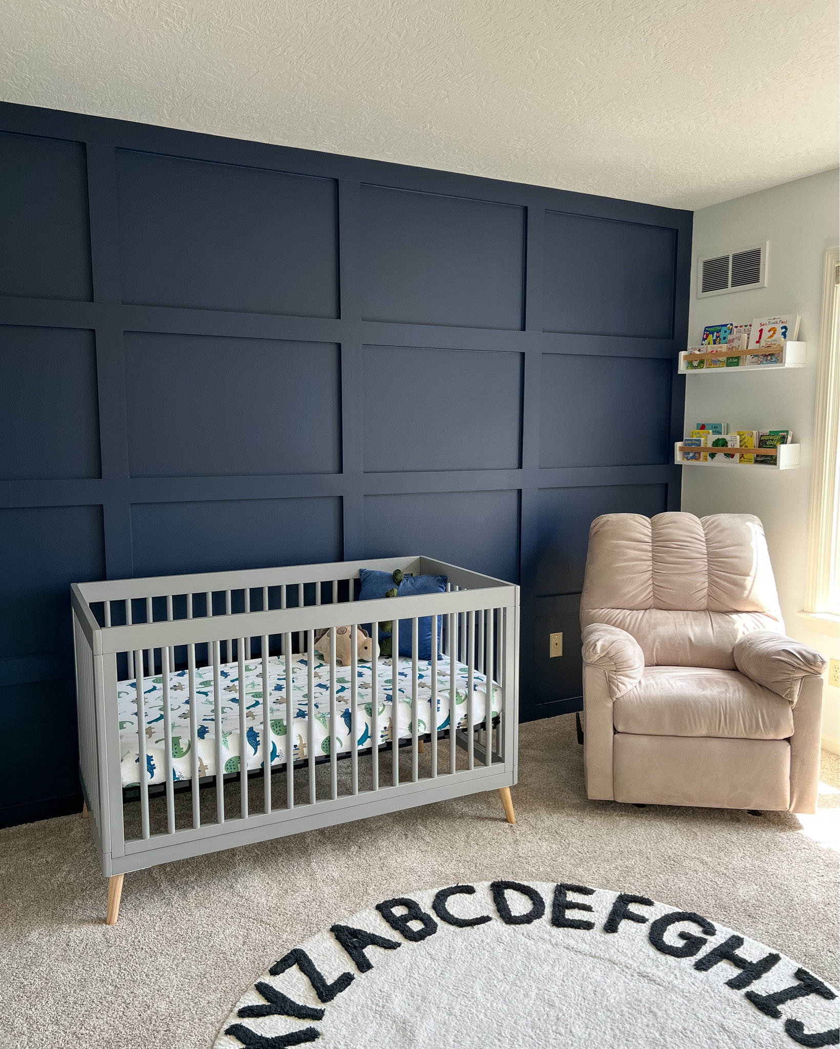 Baby boy nursery. Dinosaur theme nursery. Boho Dino nursery. Baby room. Boys room idea. Board and batten wall. Accent wall. Home decor. Nursery decor. Crib. Nursery bookshelves 

#LTKhome #LTKbaby