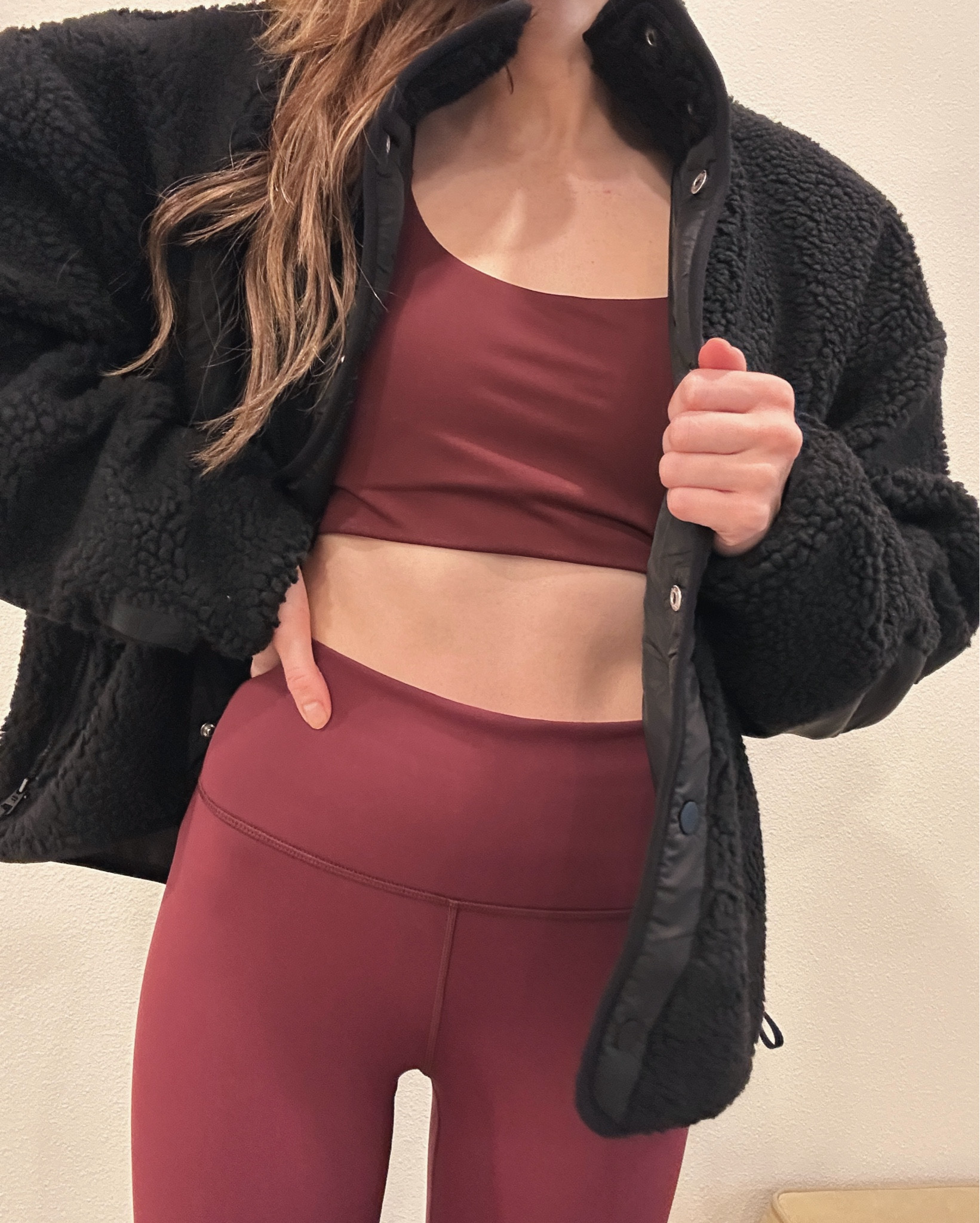 fabletics december outfit 🤍 perfect for the holidays! wearing the black teddy coat and low impact sports bra + high waisted leggings in merlot all in size xs #FableticsPartner 

#LTKSeasonal #LTKHoliday #LTKFitness