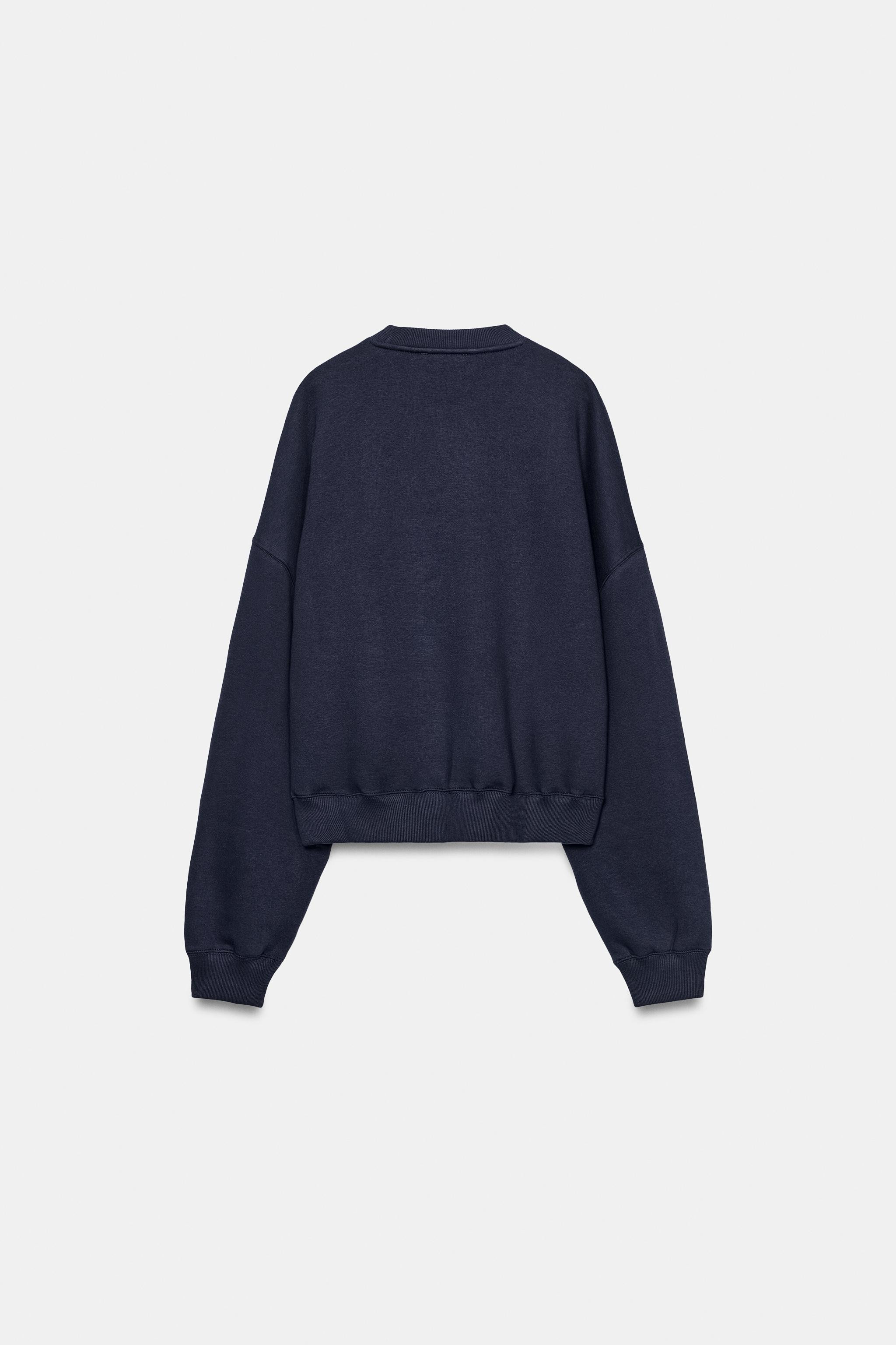Model height: 173 cmSweatshirt made from a cotton blend. Features a round neck, long sleeves and ... | Zara UK