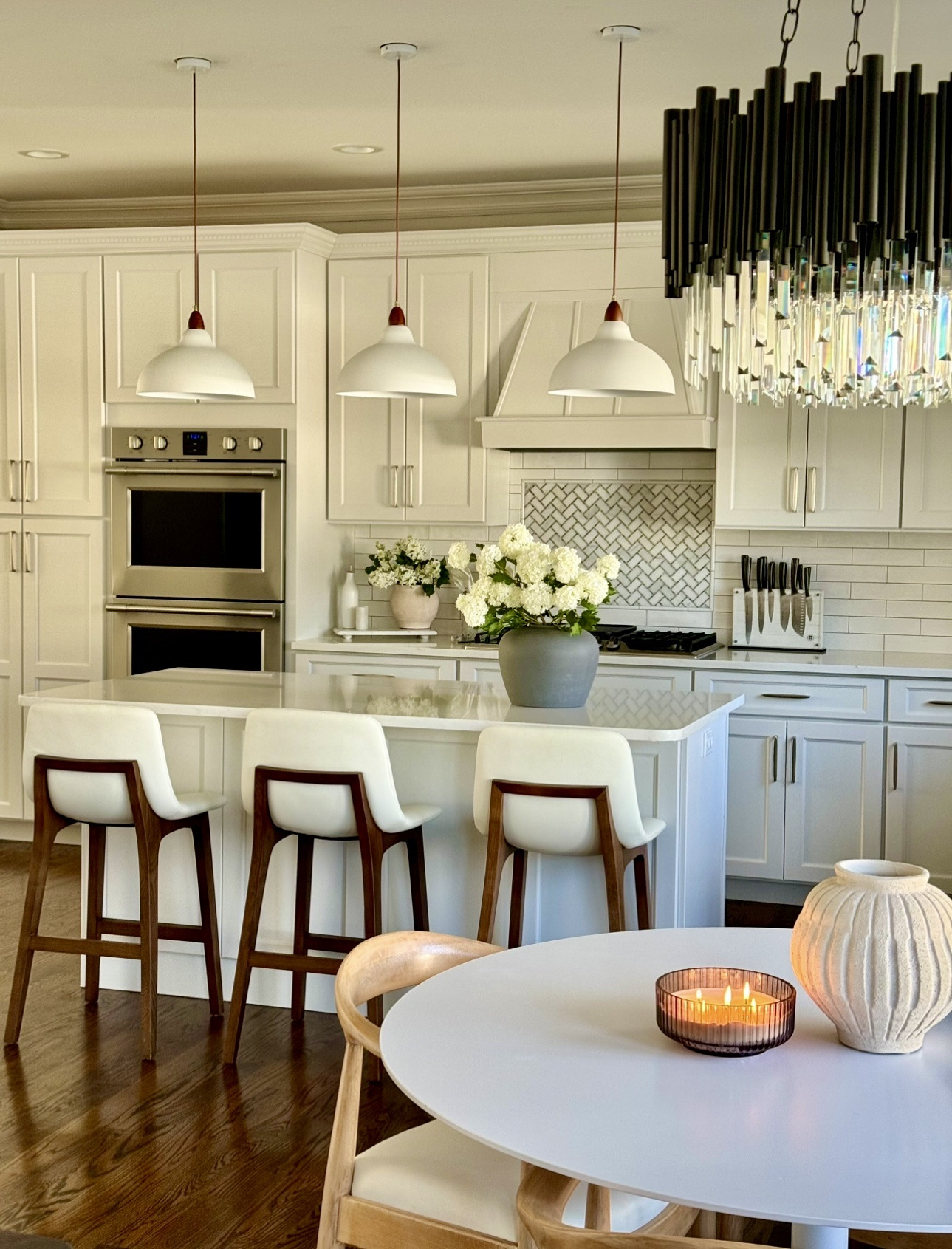 Spring decor in the kitchen should feel fresh, light, and livable. A simple faux floral arrangement on the island softens the space while still keeping everything functional. I’m always drawn to neutral florals that blend seamlessly with white kitchens, warm wood tones, and classic finishes.

This is one of my favorite ways to add seasonal decor without clutter—clean lines, subtle texture, and pieces that feel timeless.


#kitchendecor #springhome #fauxflowers #neutraldecor #kitchenislanddecor #modernclassic #homeaesthetic #springstyling #homedecorideas #whitekitchen #countertopdecor #interiorinspo #quietluxurystyle

#LTKHome #LTKSeasonal #LTKmomlife