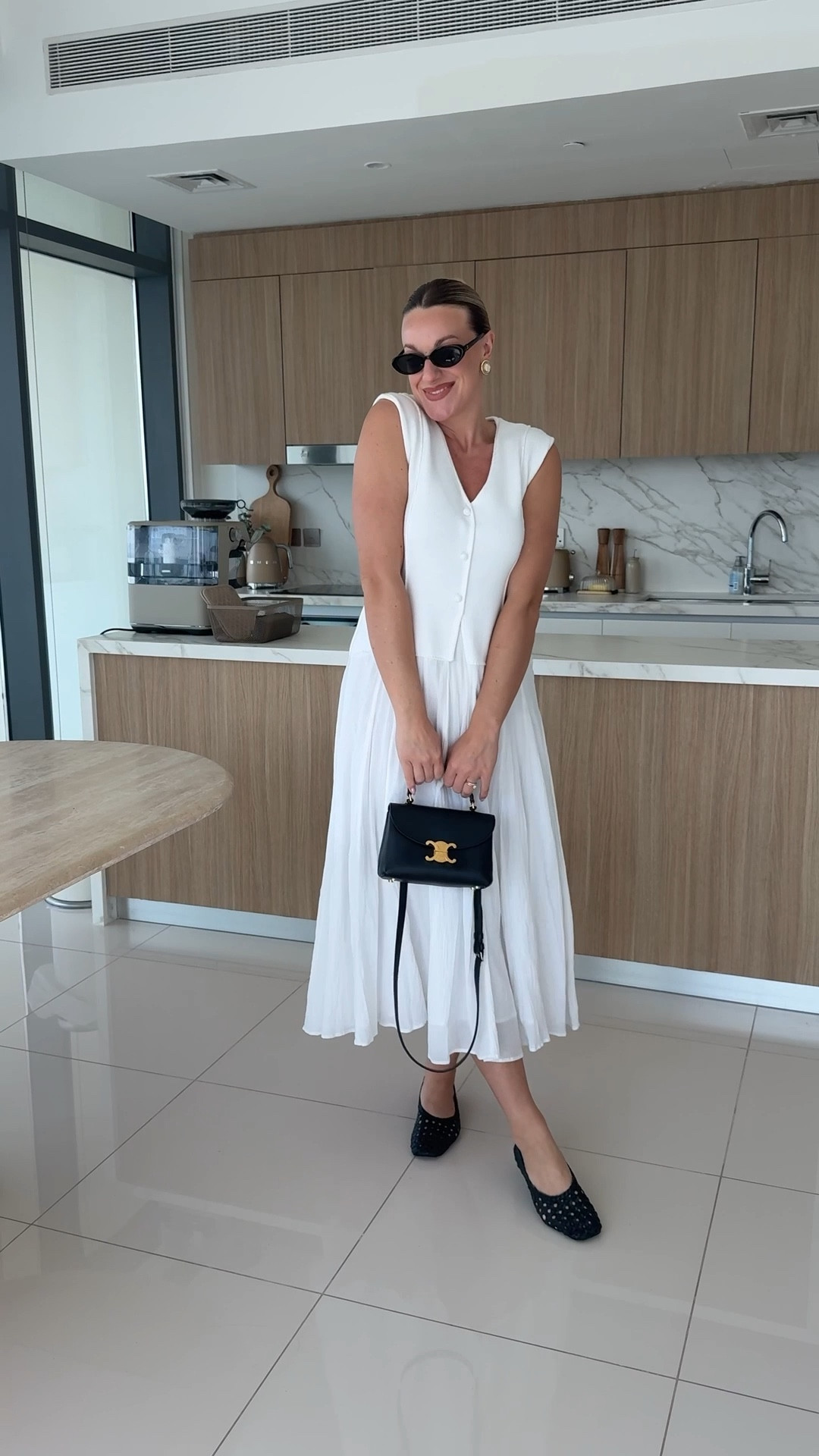 GRWM bloat friendly summer dress- dubai outfit of the day 
White dress from mint velvet 
Black weave ballet flats from Karen Millen 
Black celine handbag teen Nino 

#LTKmidsize #LTKluxury #LTKeurope