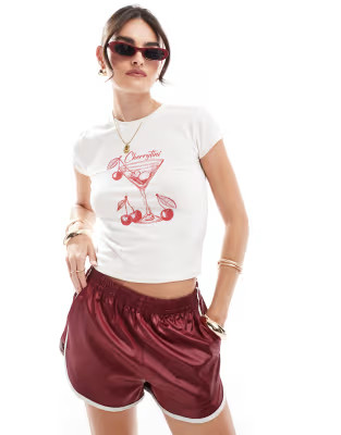 ASOS DESIGN baby tee with cherry martini drink graphic in cream | ASOS (Global)