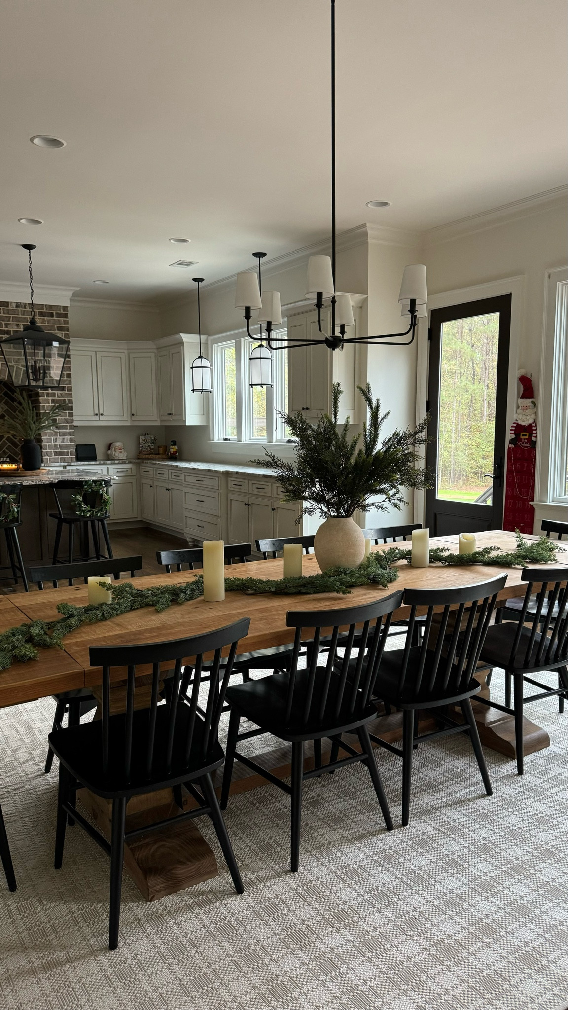 Dining table, dining table light, kitchen light, & greenery stems on dining table 


#LTKSeasonal #LTKHome #LTKHoliday