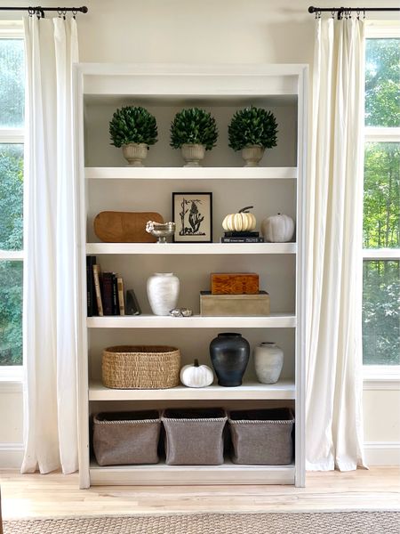 Shelving adds interest and depth to your home and is perfect for changing up decor throughout the seasons. We added faux pumpkins to the baskets and boxes. 

#LTKstyletip #LTKhome #LTKSeasonal