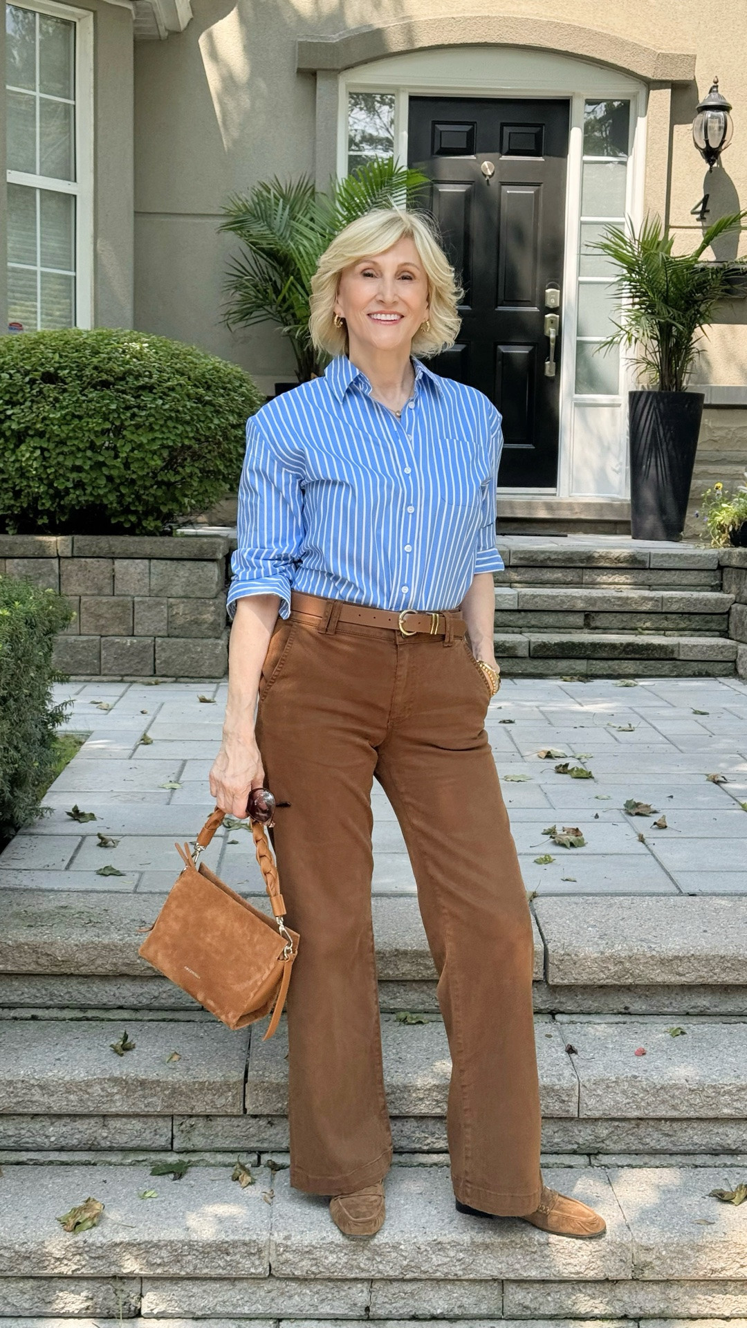I love the modern mix of classic blue-and-camel 💙🤎

This blue striped shirt feels so fresh and effortless paired with camel wide-leg jeans, my favourite loafers and a suede bag. It’s one of those outfits that looks put together without feeling like I tried too hard — which is exactly what I want from everyday style.

#LTKSeasonal #LTKOver40 #LTKootd