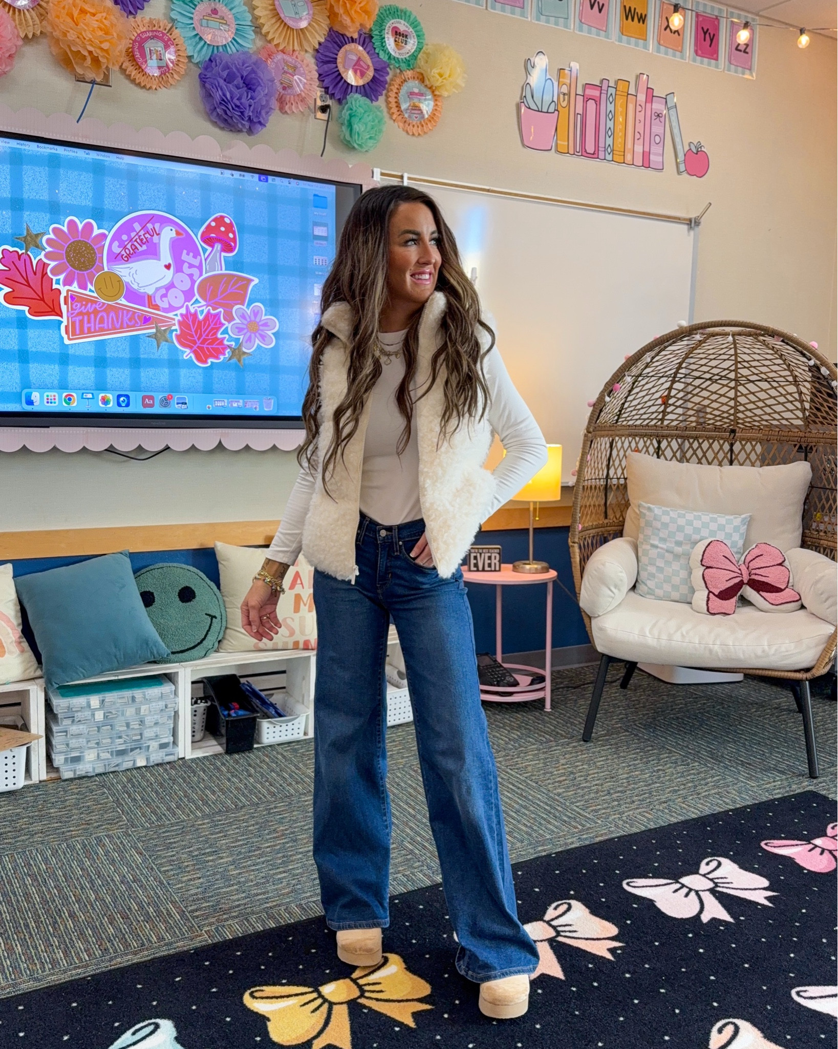 Friday’s classroom look: the softest cozy sherpa vest, cream top, wide-leg jeans, and platform clogs. Warm layers, easy neutrals, and a comfy fit for teaching all day. I linked my vest, jeans, and shoes on LTK if you want them too. 🤍

teacher outfit inspo, everyday teacher style, neutral winter outfit, sherpa vest outfit idea, wide leg jeans trend, platform clog outfit, comfy school outfit, teacher wardrobe basics