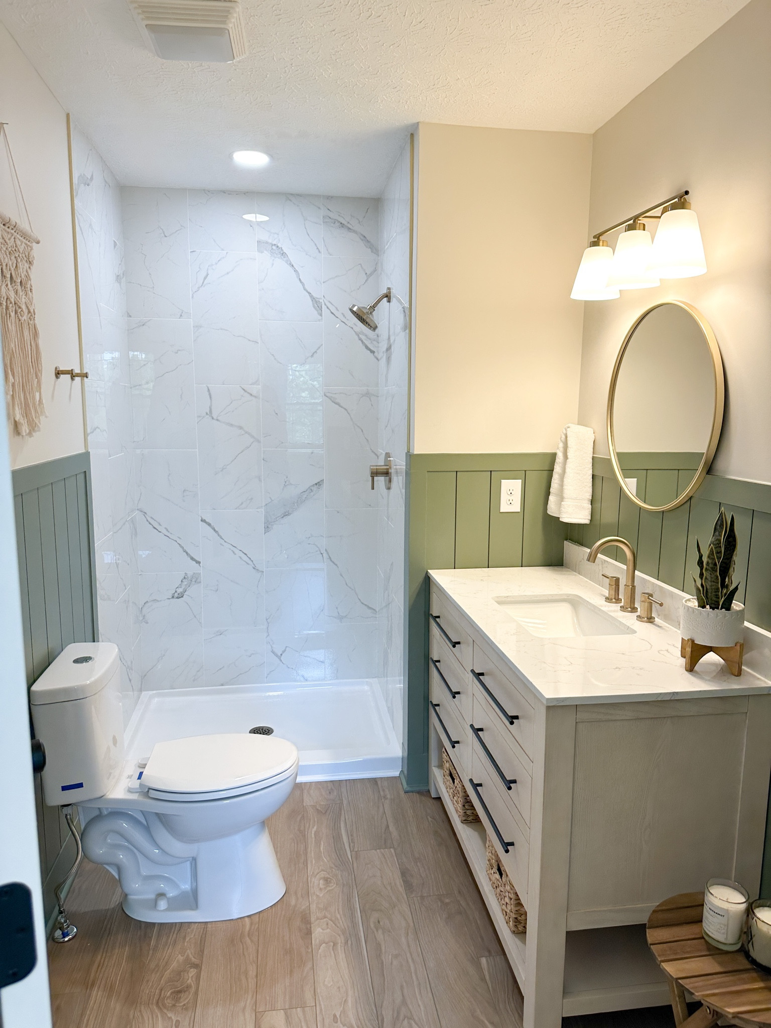 Jr suite // full bath // wood vanity // gold faucet // bathroom remodel // shiplap // green accent wall 

#LTKFind #LTKhome #LTKunder100