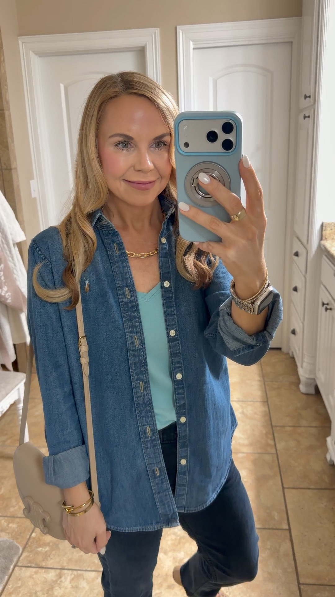 Rainy day work outfit! LURVE this denim polo button down 

#LTKPetite #LTKootd #LTKWorkwear