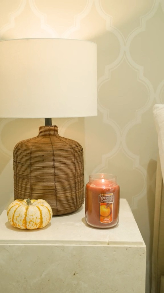 Walmart Home Decor. Gift guide for our home decor lovers from Walmart! Rattan table lamp. yankee pumpkin spice candle. Better homes and gardens warm persian throw pillow. Silver one international chunky knitted throw blanket. 

#LTKFind #LTKhome #LTKGiftGuide