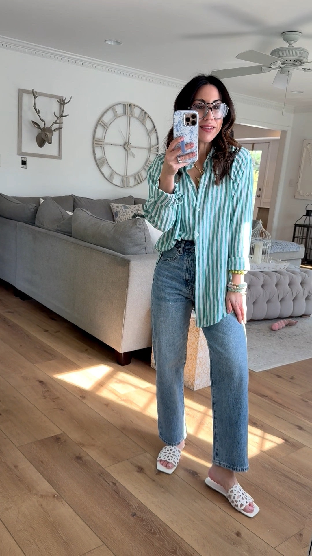 Small button-down shirt. Straight leg jeans I sized up to a 26. Sandals TTS. Jewelry code HOUSEOFLEO20. Glasses code TAMMY10AM

#LTKOver40 #LTKSaleAlert #LTKPetite