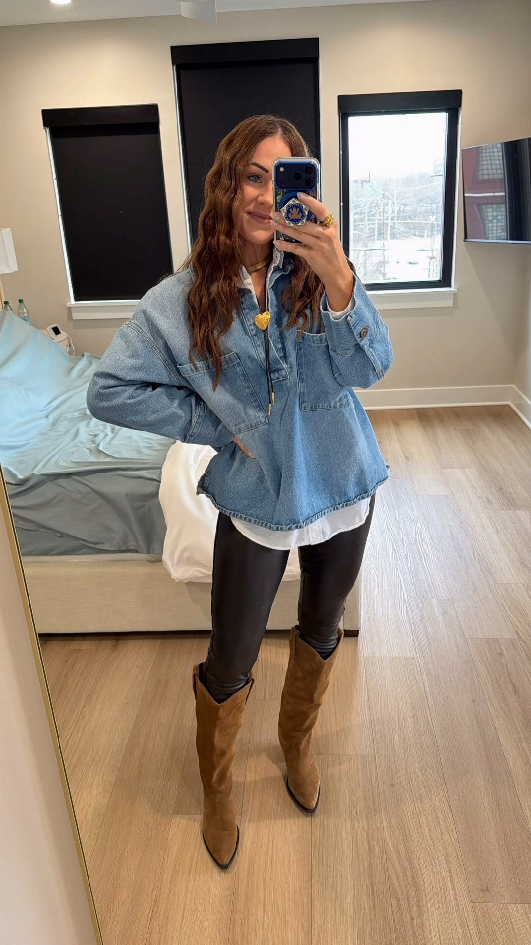 Winter travel vacation outfit cold weather styling leather leggings cowboy boots Amazon white button down H&M denim overshirt 

*Collar and bolo tie are from November Maker