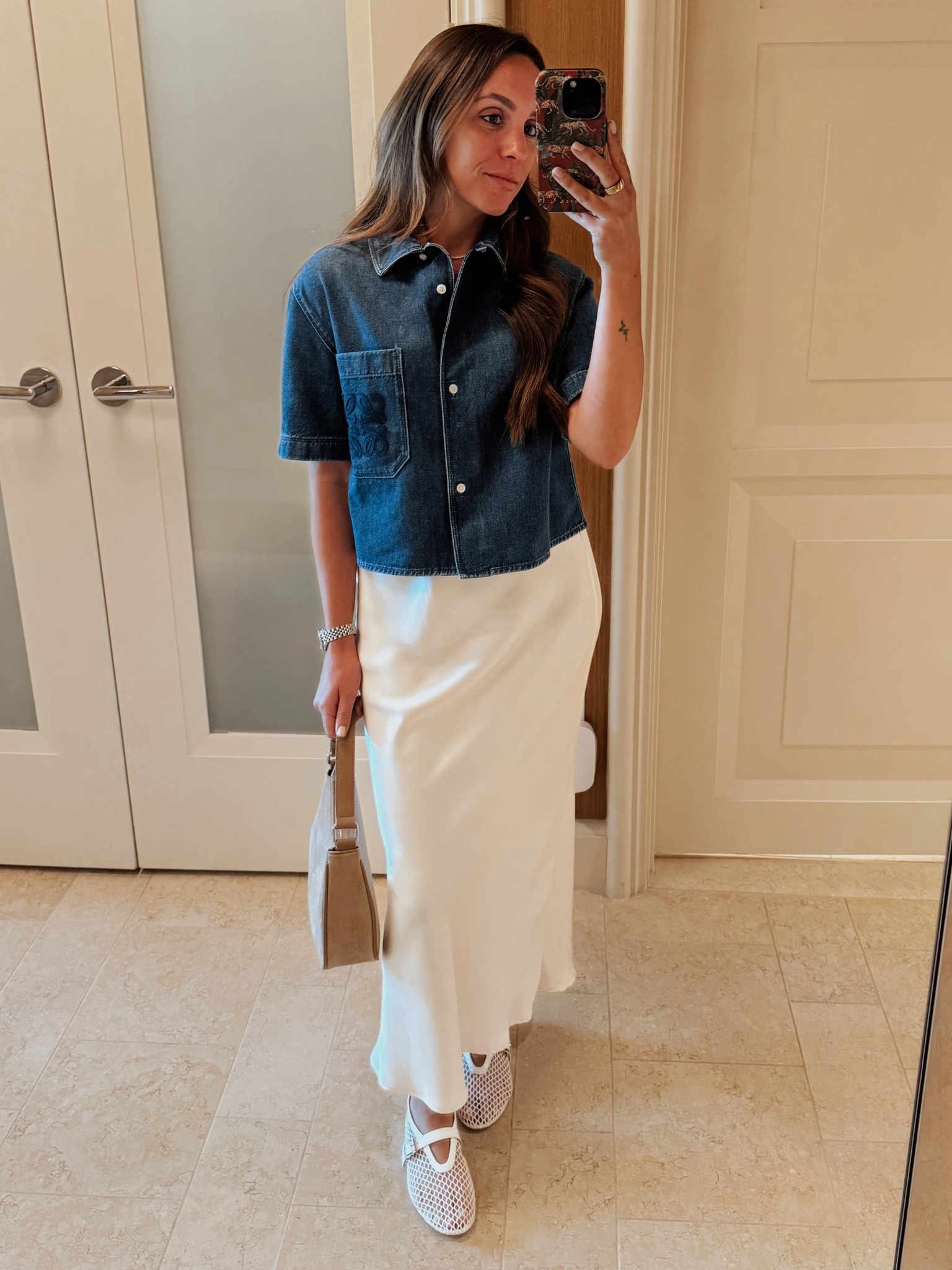 Summer Uniform Unlocked ☀️🧊
Denim up top, silk on the bottom—this combo is effortless and elevated. Linking everything from this soft maxi skirt to the comfy mesh flats that go with everything. Tap in for easy summer polish 🤍

👉 Shop the full look on my LTK! #LTKsummer #LTKstyletip #easychic #ootd

#LTKItBag #LTKShoeCrush #LTKSeasonal