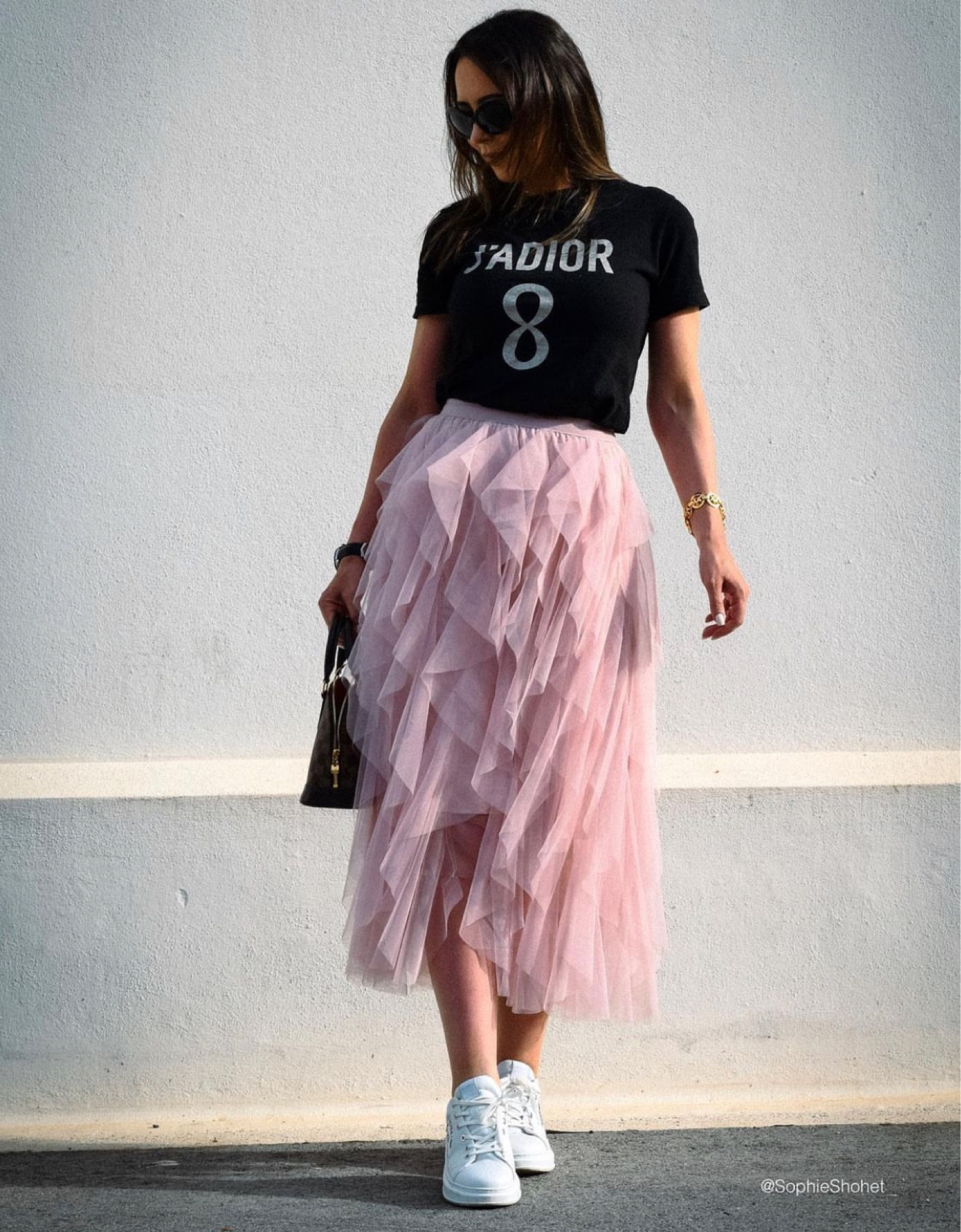 Black graphic tshirt, pink ruffle princess skirt, pink fluffy dip hem skirt, white trainers, black handbag 

#LTKeurope #LTKSeasonal #LTKstyletip