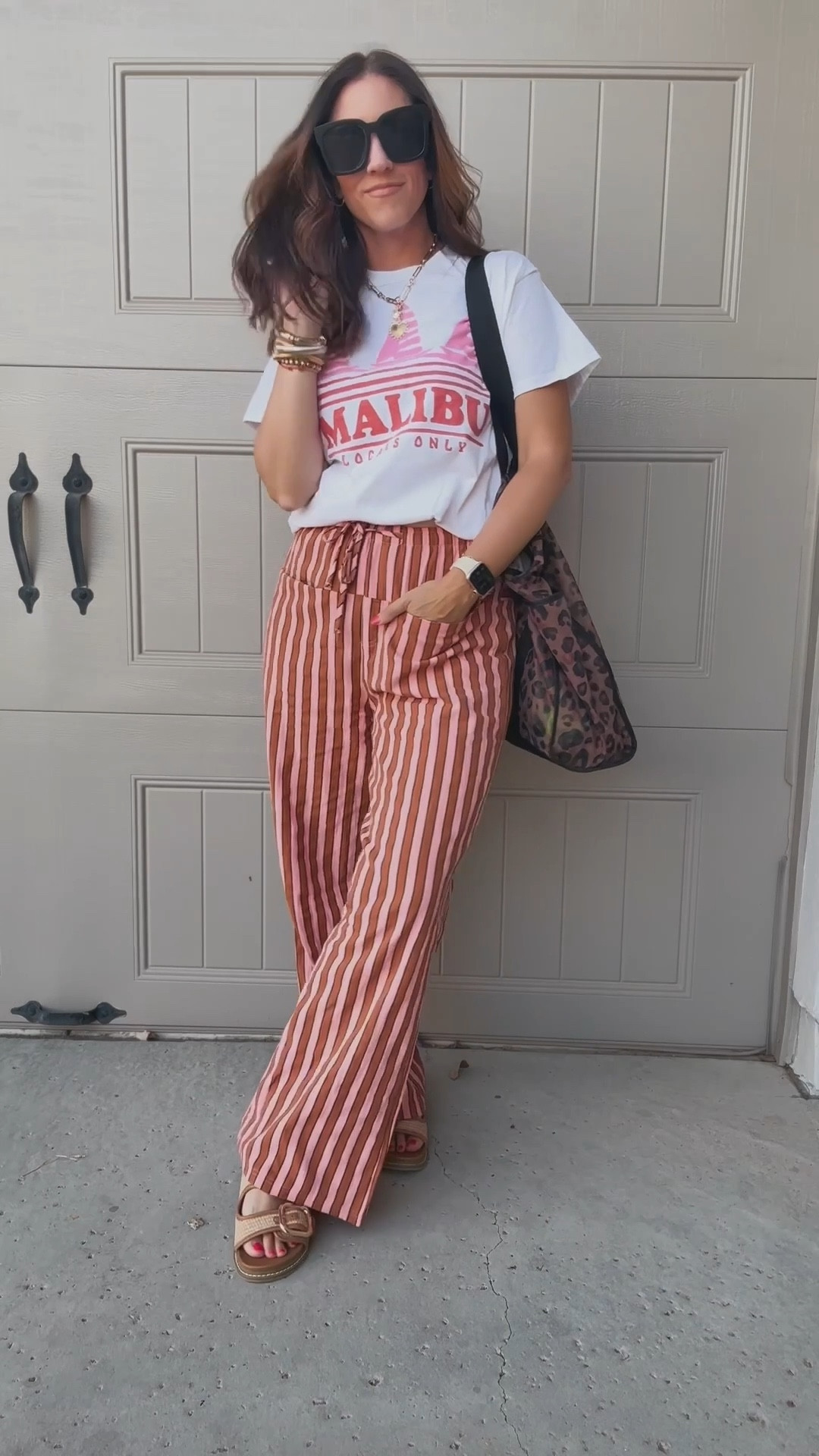 Cool, casual mom vibe outfit for spring! 🌸❤️🧡 Wearing a size small in the graphic tee and the free people look for less striped pants

#LTKOver40 #LTKFindsUnder50 #LTKStyleTip