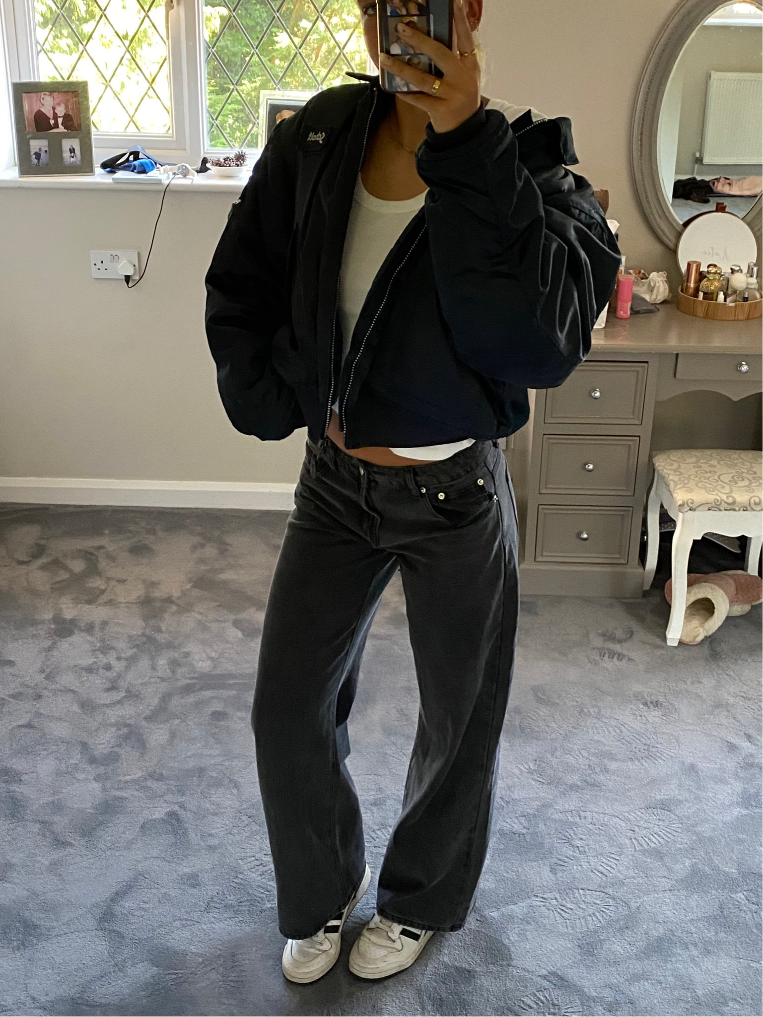 White scoop long sleeve top, low rise black wash jeans, adidas trainers, schott bomber jacket 

#LTKSeasonal #LTKstyletip #LTKeurope