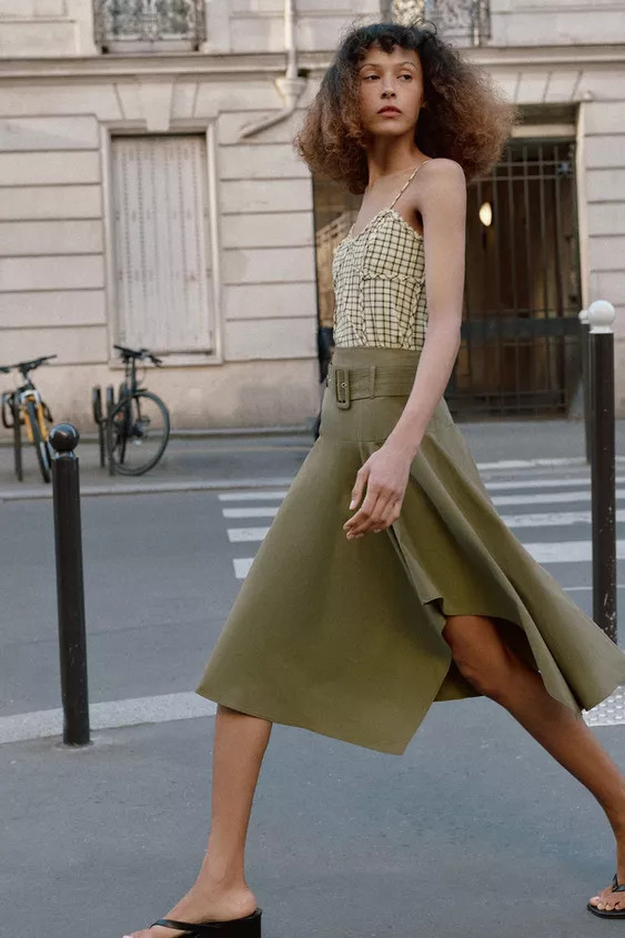Skirt with a matching belt and an asymmetric hem. Invisible side zip fastening. | Zara DE
