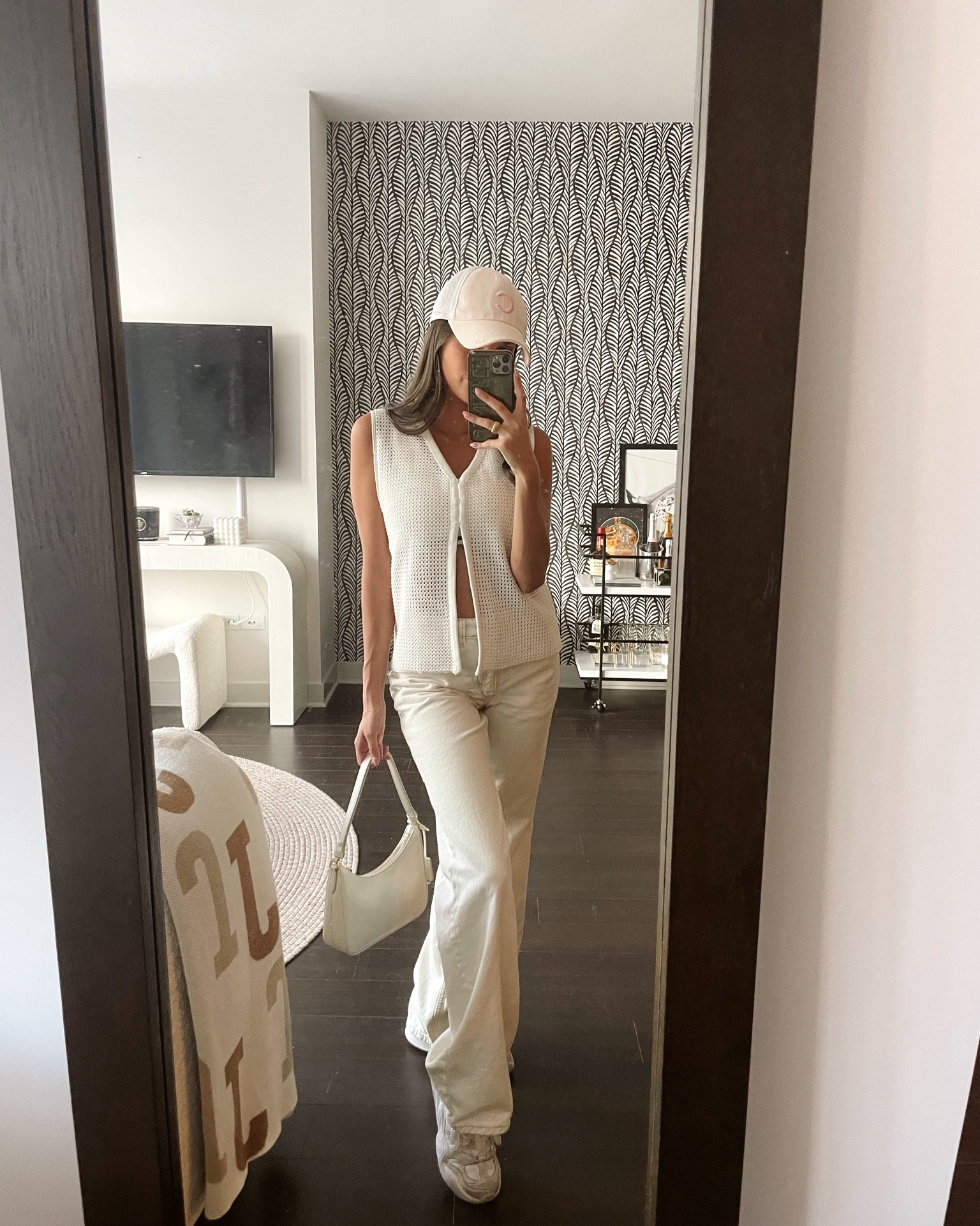 Monochromatic look for Chicago Cubs game. Baseball game outfit. Pink Cubs hat. White denim. White baggy jeans. Designer purse. Chunky sneakers. Knit top. September style. Fall fashion. Seasonal transition looks. 

#LTKStyleTip #LTKFallSale #LTKSeasonal