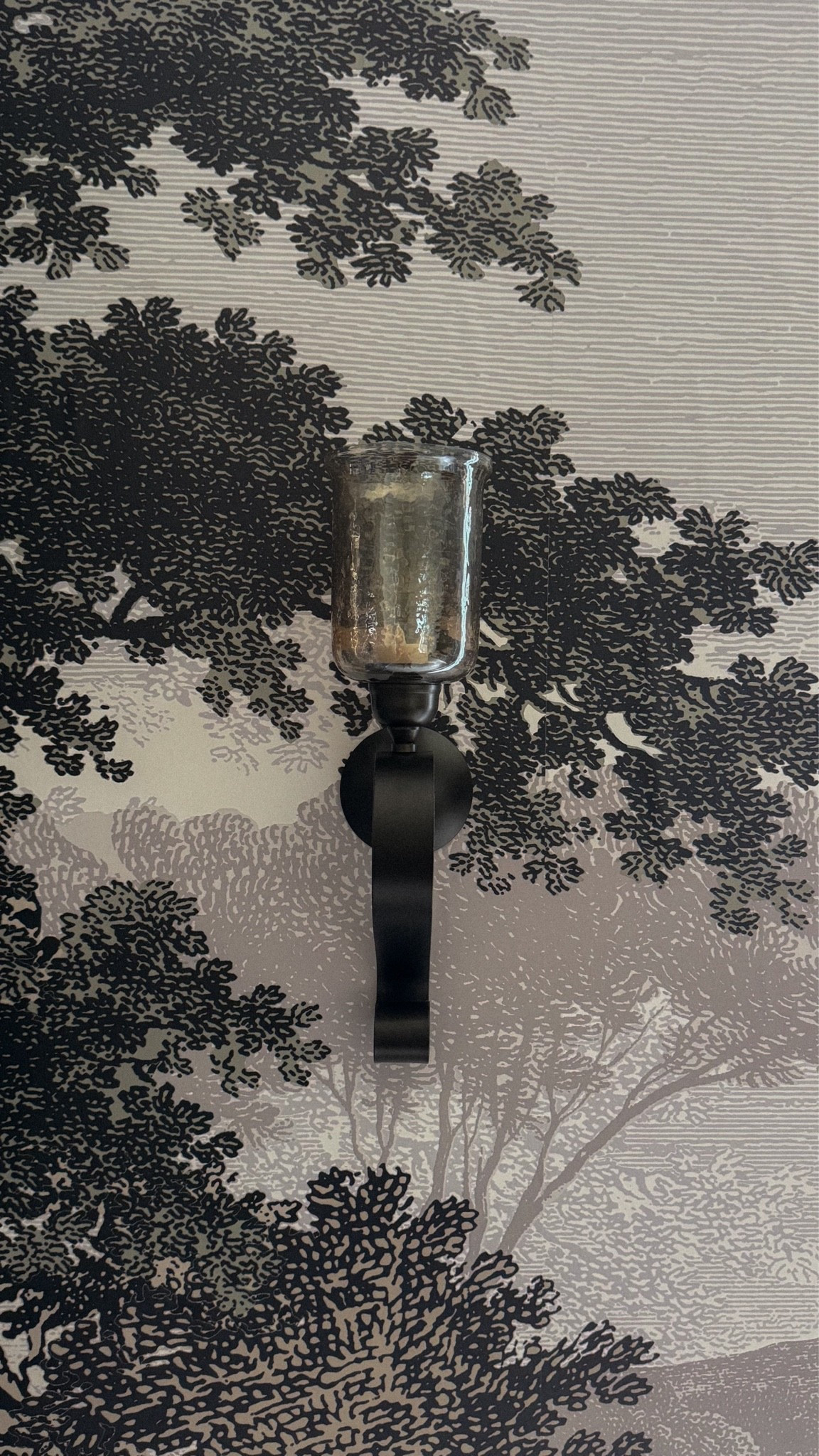 #yorkwallcoveringspartner One design choice that instantly makes a room feel custom? A scenic mural. ✨ 

For our movie room, I used @york_wallcoverings ' Morning Light Scenic Pastures Peel & Stick Mural, ( https://bit.ly/4ycYvmD ) and it's completely transformed the space. What surprised me most is that I ordered three panels of the same mural, and the design seamlessly repeats itself, picking up right where it left off. This allowed me to continue the landscape across multiple walls and create a much more immersive, designer-looking room. 

It's one of those details that makes people stop and ask, "Wait... who designed this space?"

If you're looking for a way to add character, depth, and that collected-over-time feeling to your home, mural wallpaper might be the design trick you've been missing.

Comment SHOP and I'll send you the link to the wallpaper. 🤍

#WallpaperMural #PeelAndStickWallpaper #DesignerTips #HomeDecorInspiration

#LTKHome #LTKstorytime