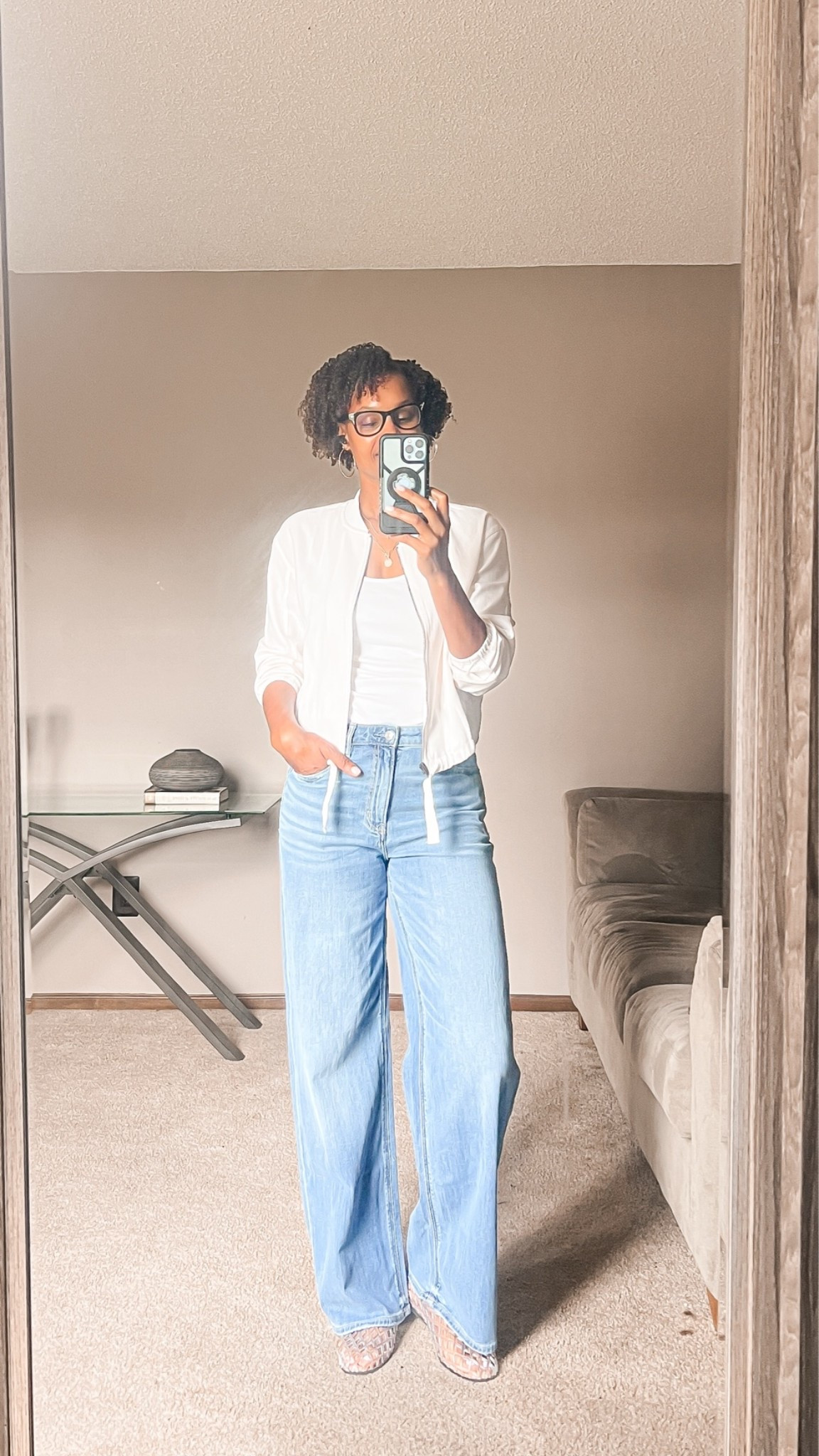 This relaxed bomber from @kohls is a nice lightweight topper for the changing weather. I really like the fit of these denim jeans from American Eagle and the slight stretch they have to them.

#LTKootd #LTKOver40