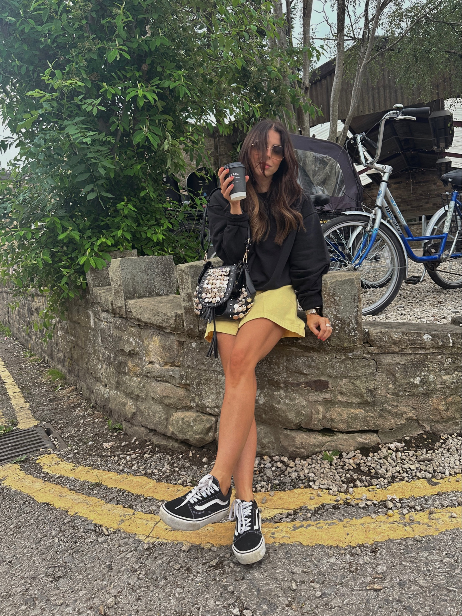 Black oversized sweatshirt
Yellow denim dress / skirt 
Platform vans 
Studded bag 
Casual summer outfits 

#LTKstyletip #LTKunder50 #LTKshoecrush