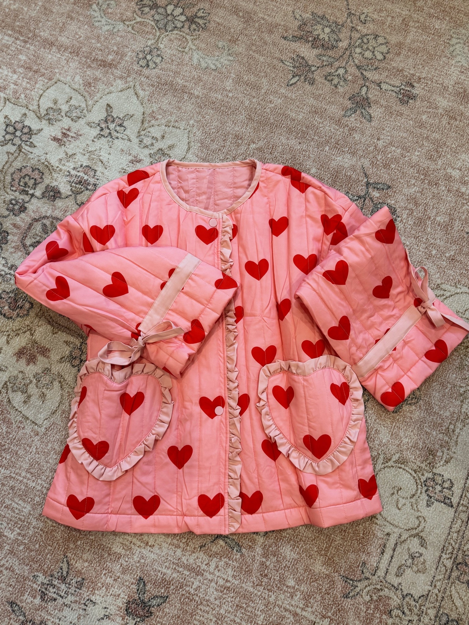 Loving this cute affordable Valentine's light puffer jacket!! The sleeves and the heart pockets 😍😍😍 obsessed!!  

#LTKFindsUnder50 #LTKSeasonal