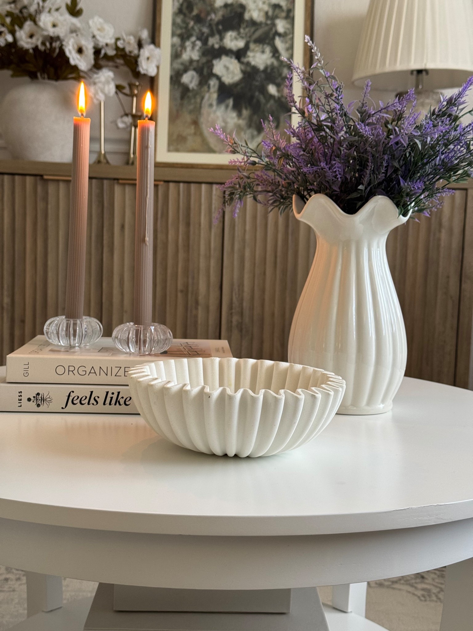 Spring coffee table refresh! Scalloped vase with glass candlestick holders and a scalloped bowl

#LTKHome #LTKSeasonal #LTKmomlife