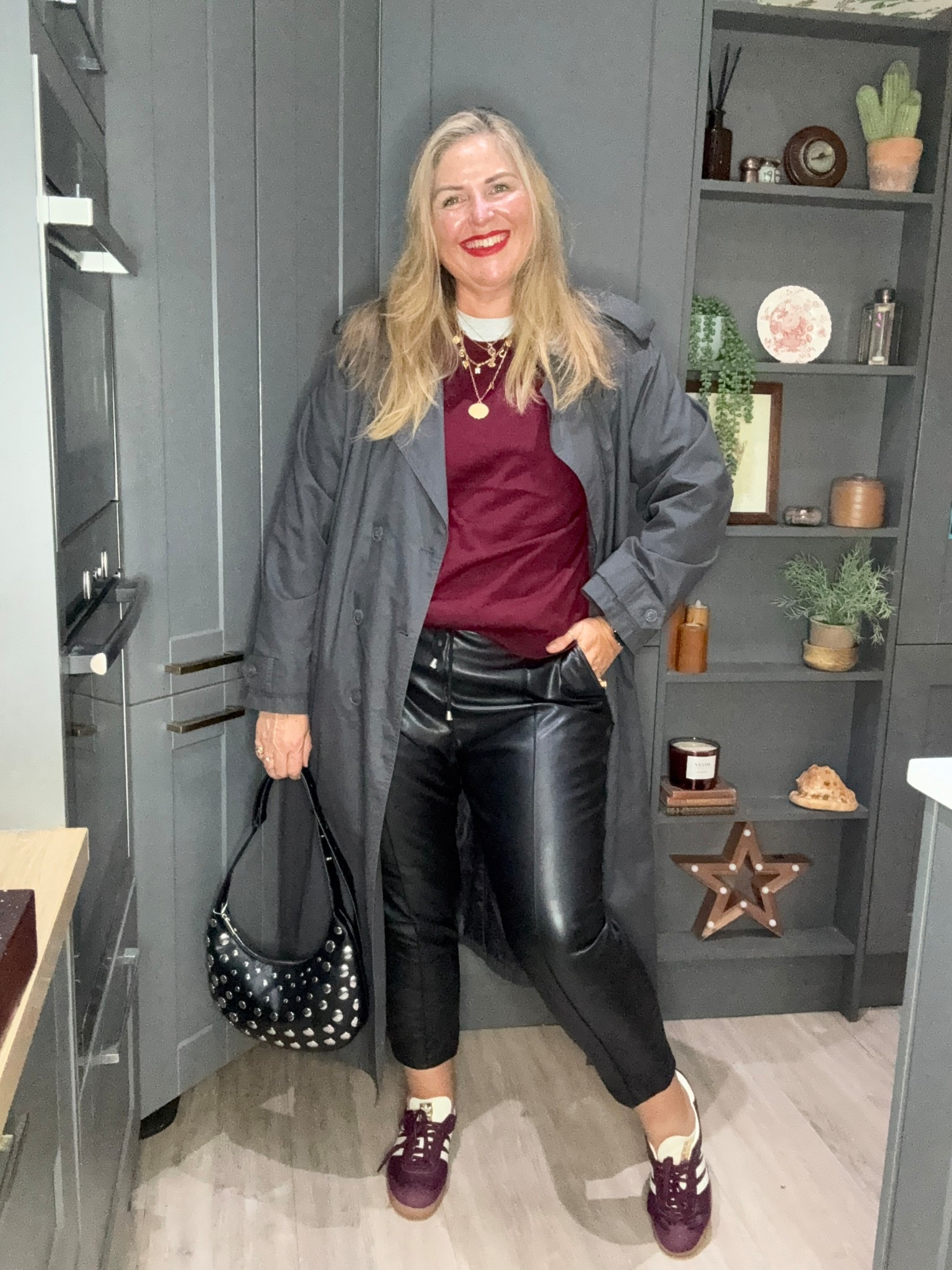 Grey trench coat, faux leather joggers, burgundy jumper, studded bag, burgundy trainers, grey tshirt 

#LTKautumn #LTKcurves #LTKplussize
