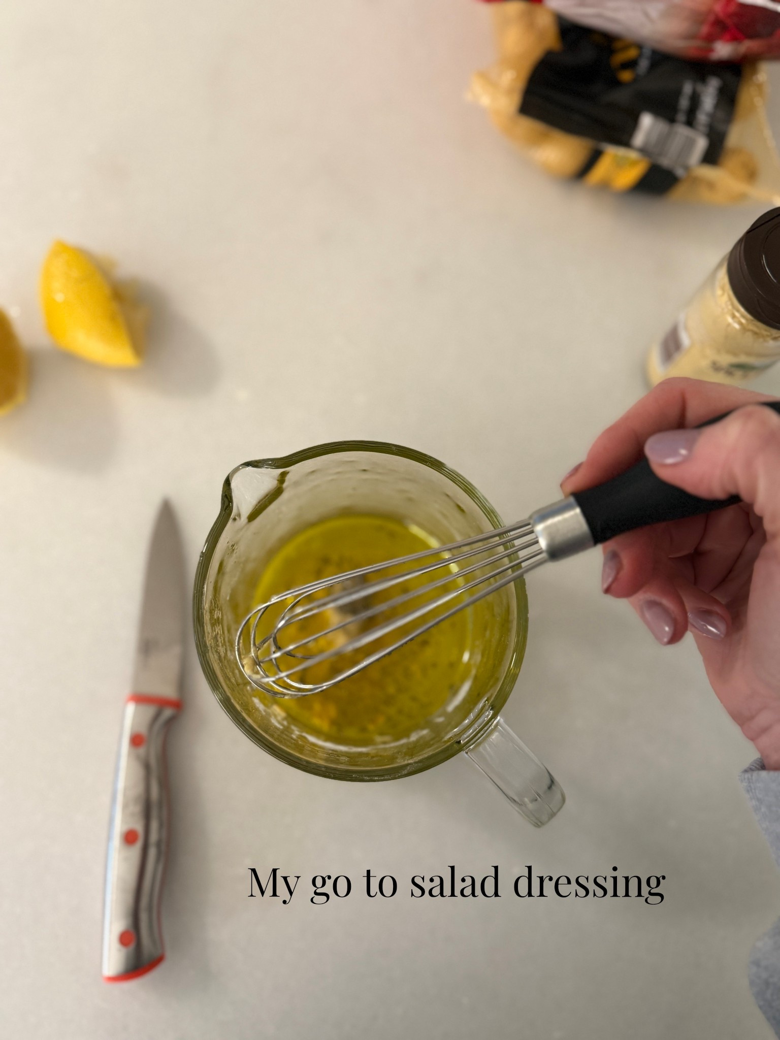 Olive oil, lemon , Dijon , thyme , honey , salt and pepper…..

Works every time! 