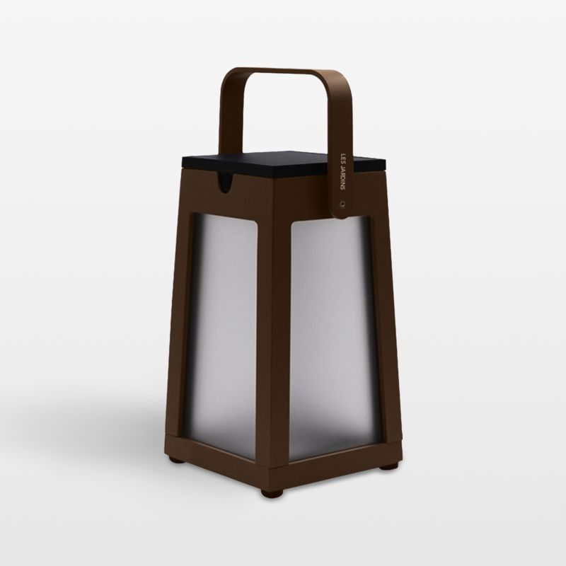 Tinka Corten Aluminum Portable Solar LED Outdoor Lantern 10.5" | Crate & Barrel | Crate & Barrel