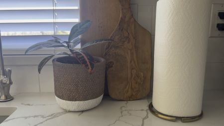 Update the kitchen with a new paper towel holder, faux or real plants and layered wood cutting boards 

#LTKstyletip #LTKunder50 #LTKhome