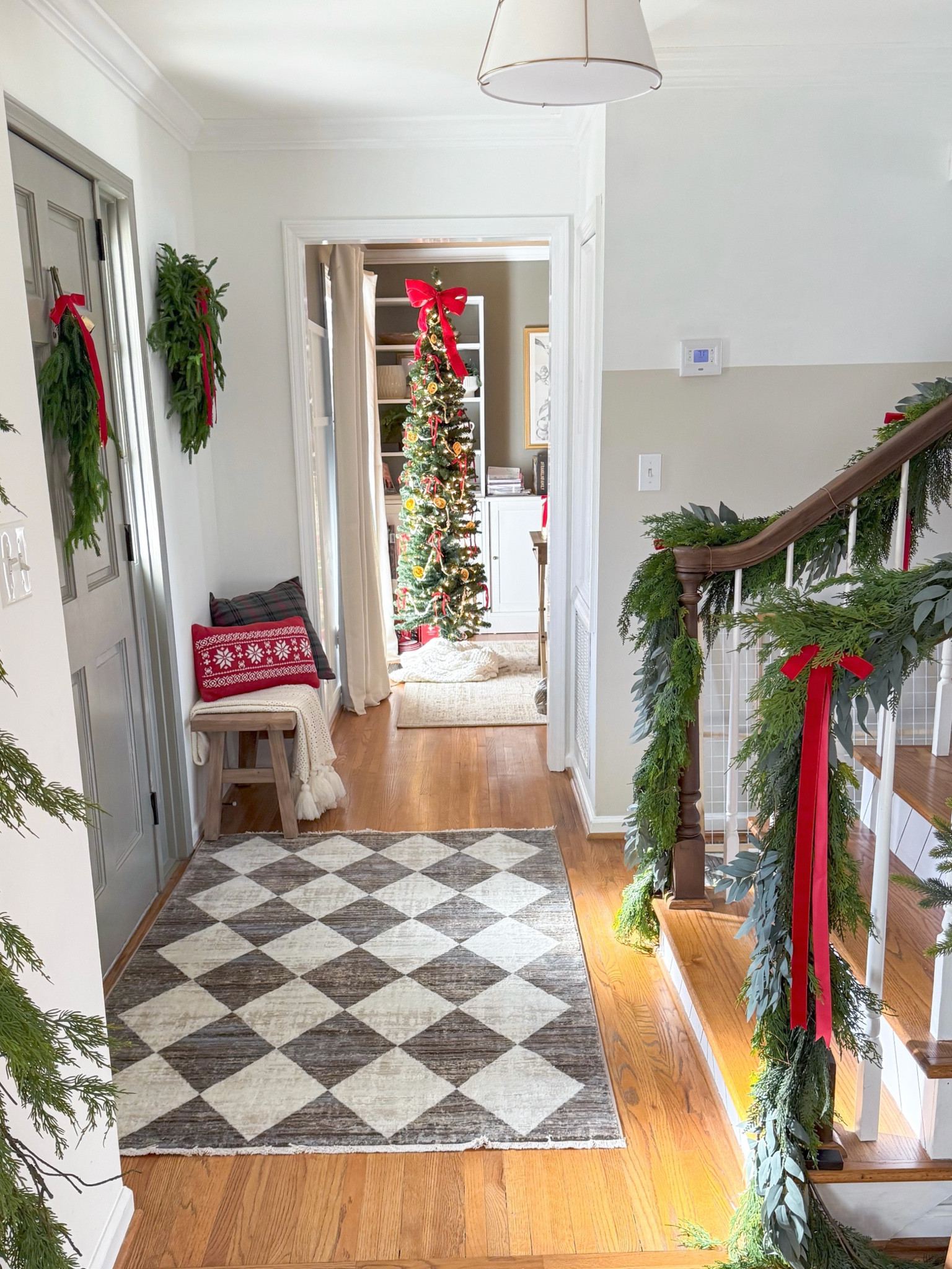 Christmas entryway 

#LTKHoliday #LTKHome #LTKSeasonal