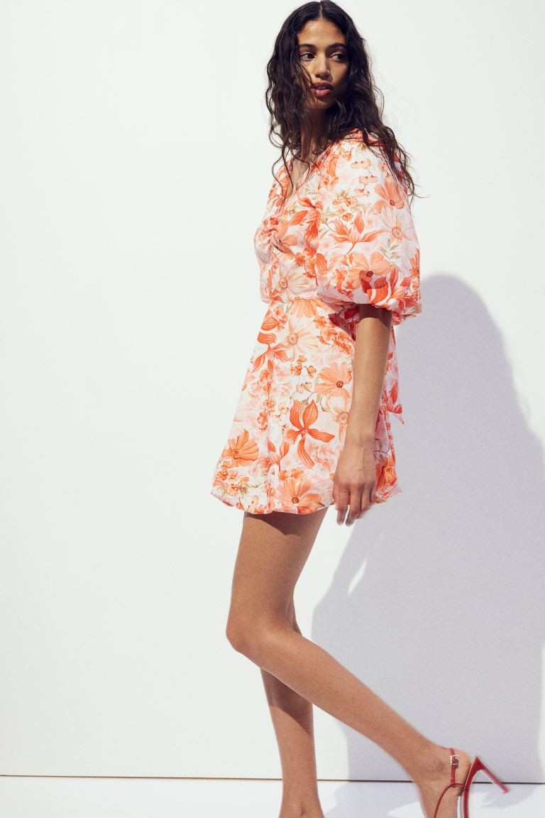 Vestido abullonado con lazada detrás | H&M (FR, IT, ES, PT, BE)