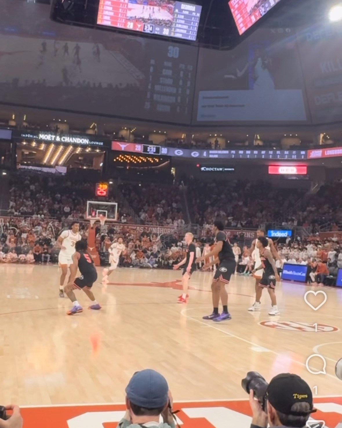 We finally beat Georgia at something 🤣 got out in the cold today to see @texasmbb dominate Georgia 87 - 67! 🏀 I wore a $30 @amazon sweater, $20 boots and $90 jacket with @judybluejeans & the perfectly stadium compliant @ysl clutch.       