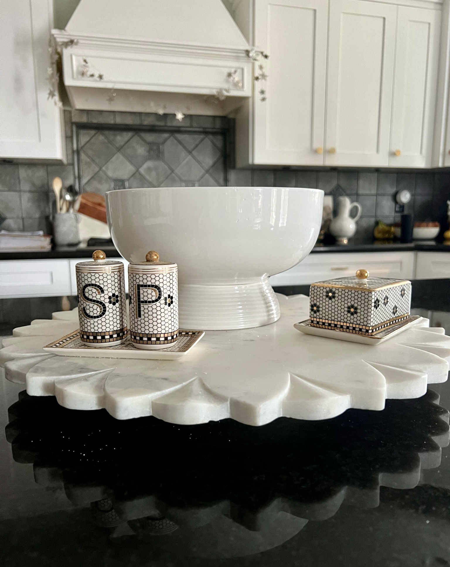 Fave little countertop marble lazy Susan! The bistro salt and pepper shakers and butter dish is my favorite! Great gift ideas! 

#LTKhome #LTKunder50 #LTKGiftGuide