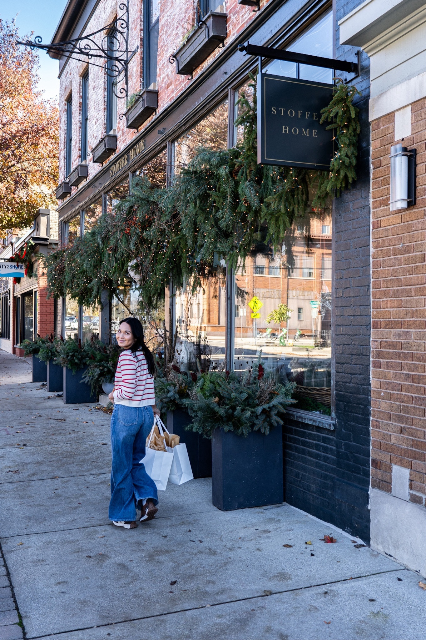 Red striped cardigan sweater, wide leg jeans, everyday sling bag, and my favorite New Balance 

#LTKitbag #LTKHoliday #LTKSeasonal