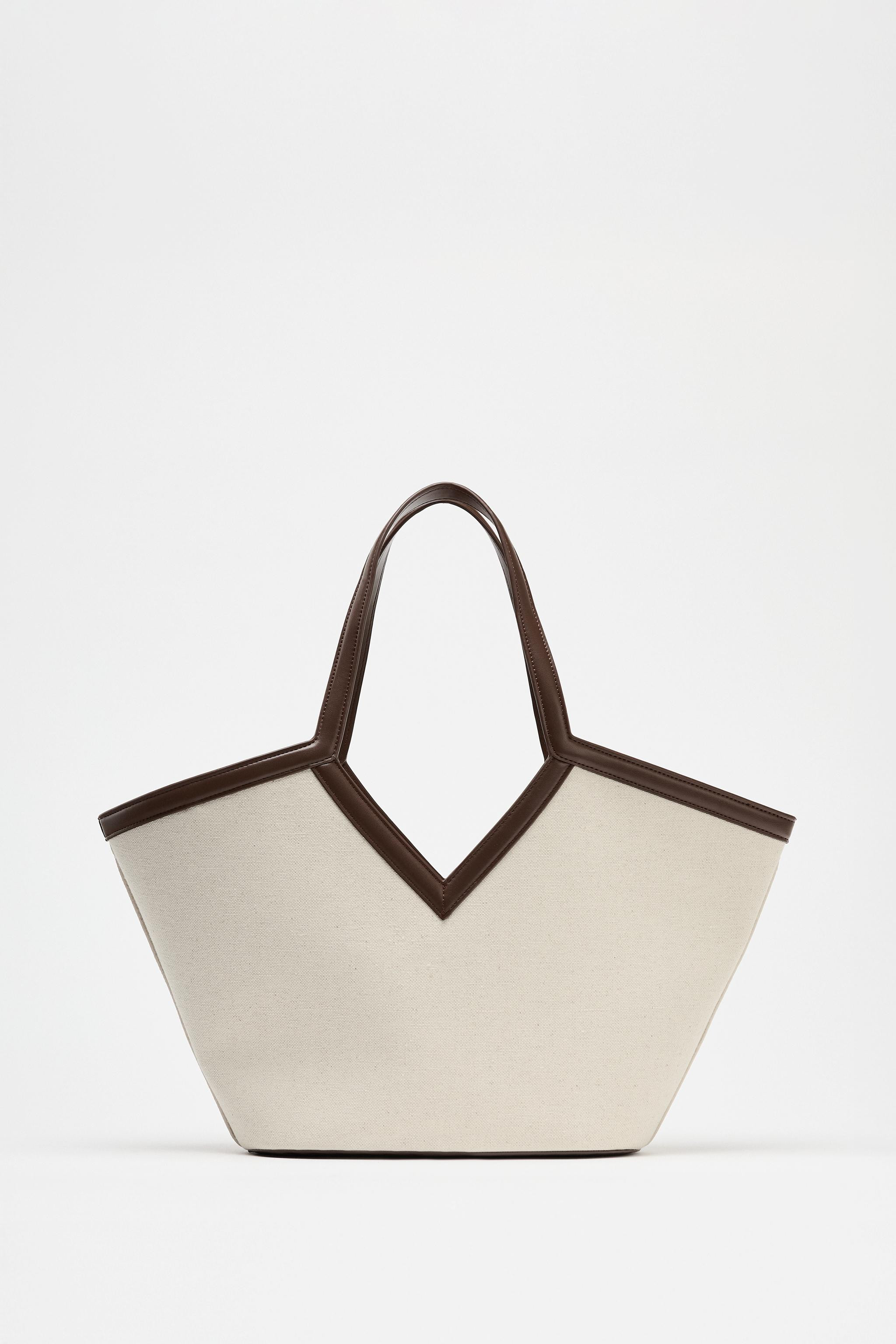 Shopper bag with a canvas body. Shoulder strap. Removable inner bag with zipper closure. Tie clos... | Zara US