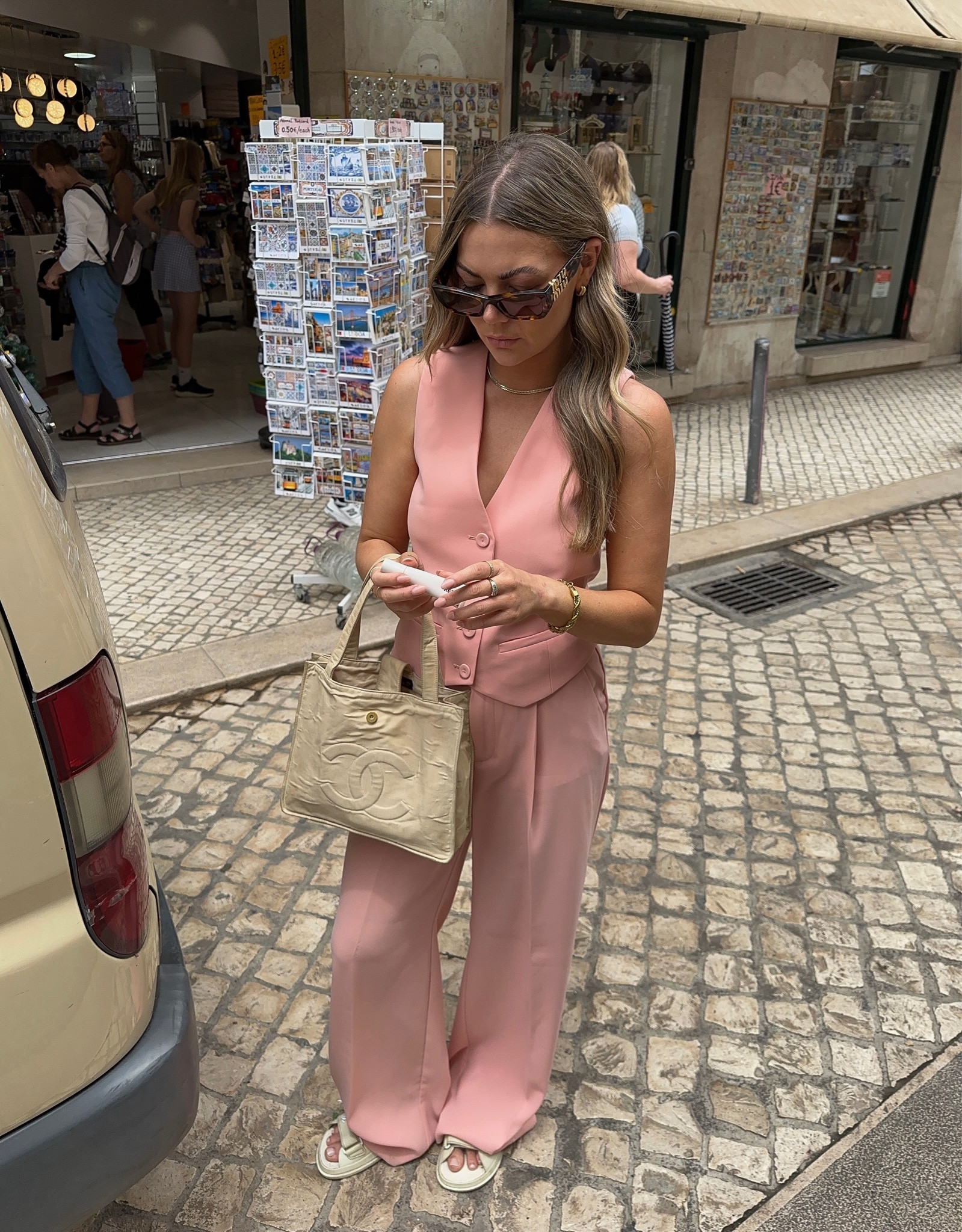 Euro summer outfit, summer outfit, holiday outfit, waistcoat co-ord, tailored trouser co-ord, summer co-ord, pink vest, pink waistcoat, tailored waistcoat, wide leg trousers, pink trouser, tailored trouser, white sandals, leather sandals, Velcro sandals, dad sandals, tortoiseshell sunglasses, vintage bag, Chanel bag, Miu Miu, Chanel, Mango, River Island, Coast, Alohas, & Other Stories 

#LTKstyletip #LTKSeasonal #LTKeurope