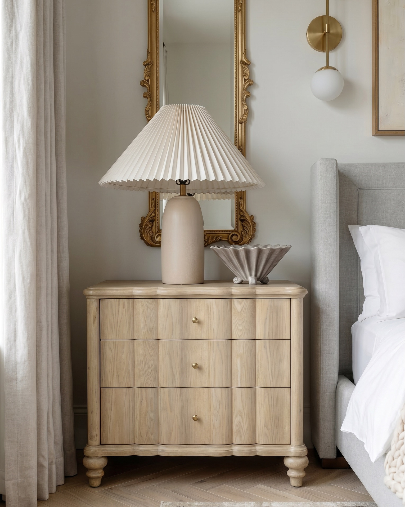 Shop the look:
• Fluted cream built-in cabinetry
• Brass cabinet hardware (pulls + knobs)
• Glass-front upper cabinet doors (reeded / ribbed glass)
• Brass dual globe wall sconces (white milk glass)
• Built-in wine fridge (glass door, brass trim)
• Espresso machine / built-in coffee station
• Decorative ceramic face sculpture
• Neutral ceramic bowls
• White ceramic pitcher
• Amber glass bottles
• Framed vintage artwork
• Decorative wood tray
• Brass bowl / catchall
• Sculptural woven vase
• Neutral decorative books
• Large woven or textured runner rug (taupe / beige)
• Light oak ceiling beams
• Light wood console table (minimal modern design)
• Upholstered round stools / vanity stools
• Neutral floral wallpaper (large-scale botanical print)
• Oversized abstract wall art (black frame)
• Brass double globe sconces
• Ceramic table lamp (neutral textured base)
• Gold sculptural ring decor
• Large rope detail ceramic vases
• Vintage-inspired neutral hallway runner
• Decorative wood bowls
• Ceramic decor accents
• Cream boucle accent chair
• Arched black-framed window
• Light gray upholstered wingback bed
• White bedding set (duvet + sheets)
• Chunky knit throw blanket (cream)
• Neutral accent pillows (textured + patterned)
• Upholstered bedroom bench (cream with brass legs)
• Light wood nightstands (3-drawer)
• Pleated table lamp (neutral ceramic base)
• Large glass vase with greenery / dried florals
• Ornate gold full-length mirrors
• Brass double globe wall sconces
• Large abstract artwork above bed
• White globe pendant light
• Vintage-inspired area rug (gray / beige)
• Light wood ceiling beams
• Soft linen curtains (cream)
• Herringbone hardwood flooring
• Small ceramic vase with dried florals
• Decorative bedside styling
• Neutral ceramic lamp
• Gold framed mirrors
• Minimal layered pillows
• Luxury hotel-style white duvet

#LTKsale #LTKhome