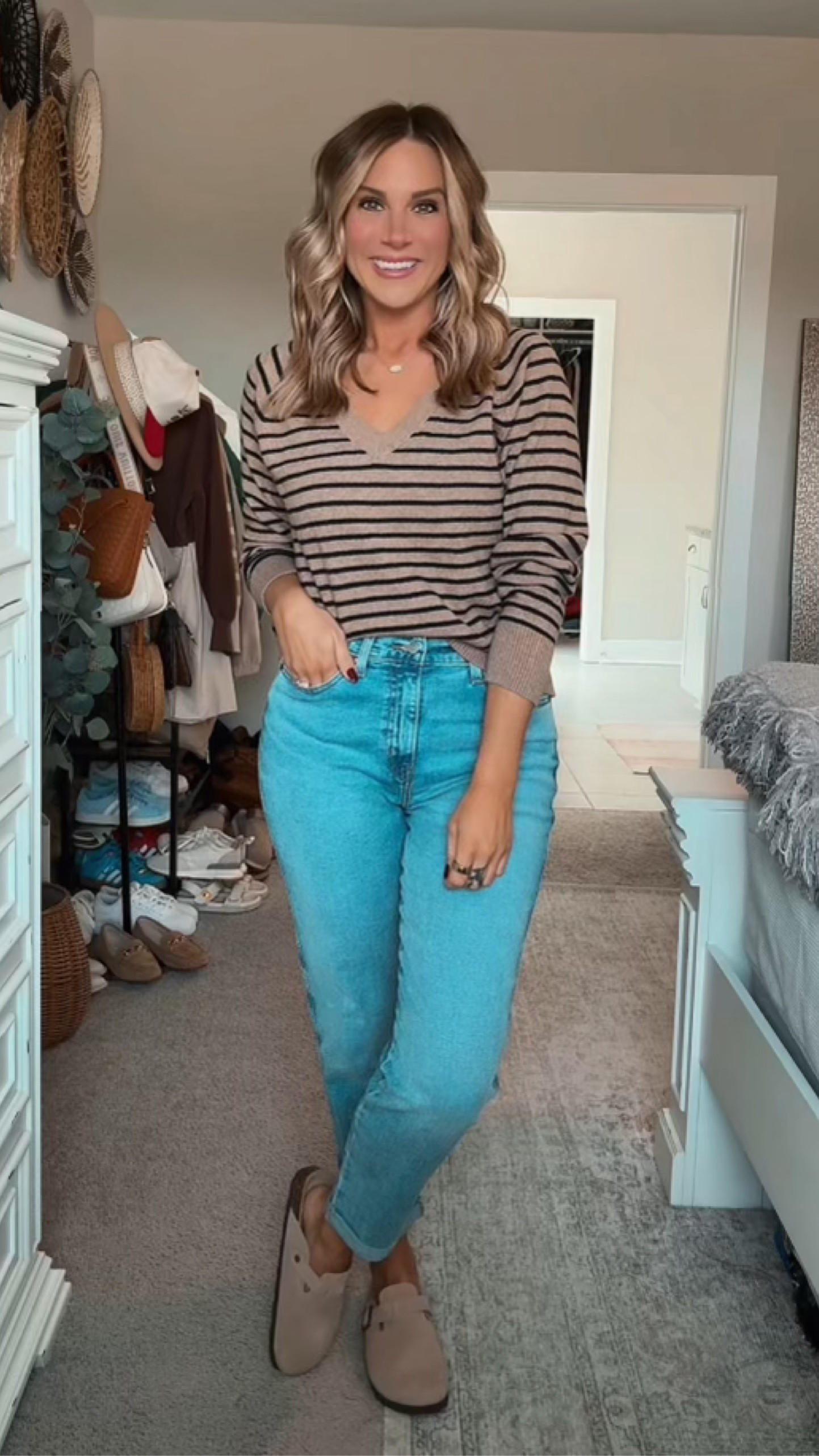 Fall is calling…and I’m here for it🙋🏼‍♀️ The black and brown striped sweater adds an elevated look to any casual mom outfit. Paired with the stylish straight leg blue jeans and brown tan clogs for the ultimate comfy but chic outfit.

#LTKSeasonal #LTKMidsize #LTKFindsUnder50