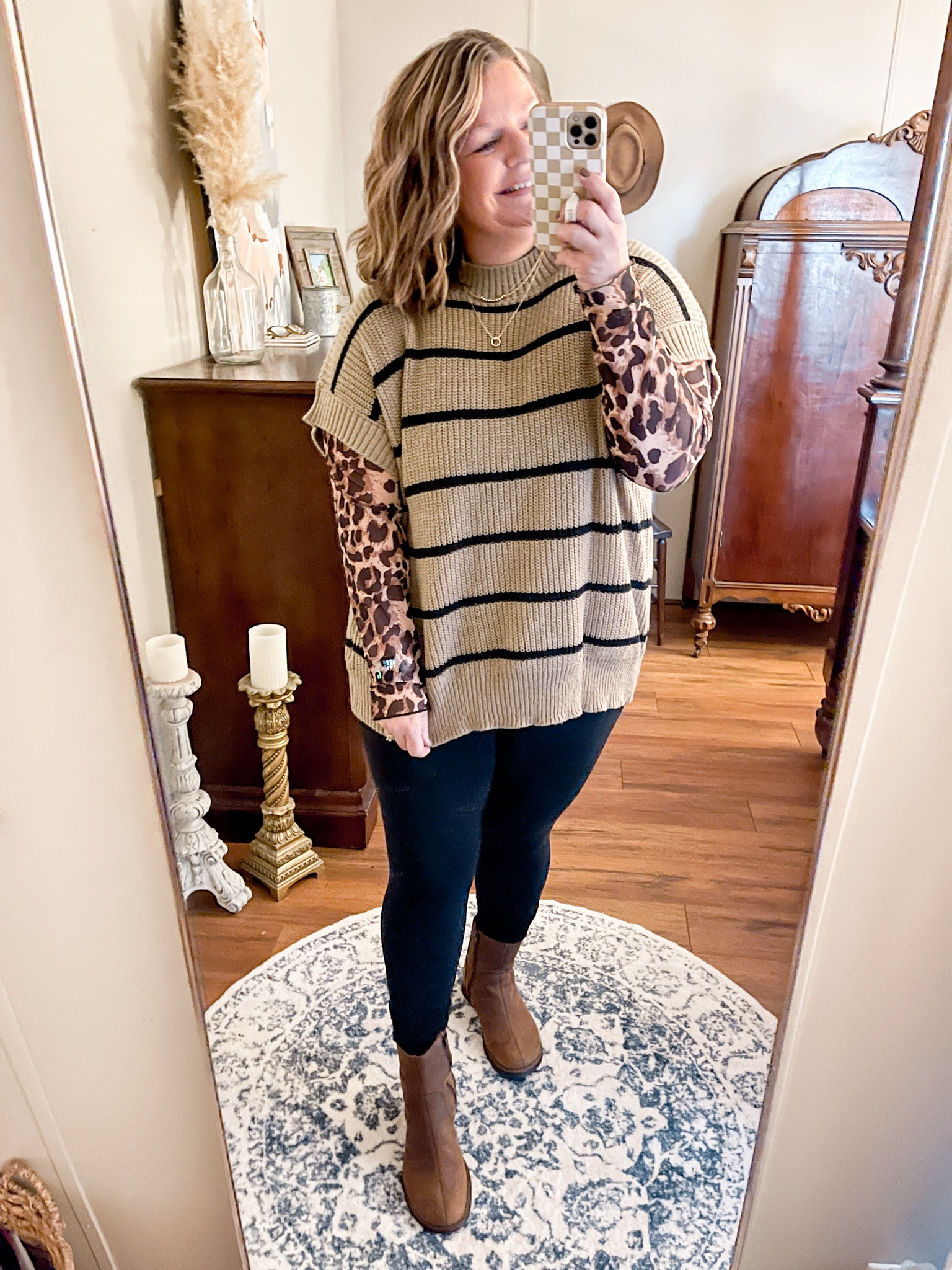 Stripes and leopard make the perfect bold combo! 🐆✨ I paired leggings, scrunchie socks and brown boots for a fun, balanced look. Have you tried mixing prints? #PatternPlay #BoldAndChic