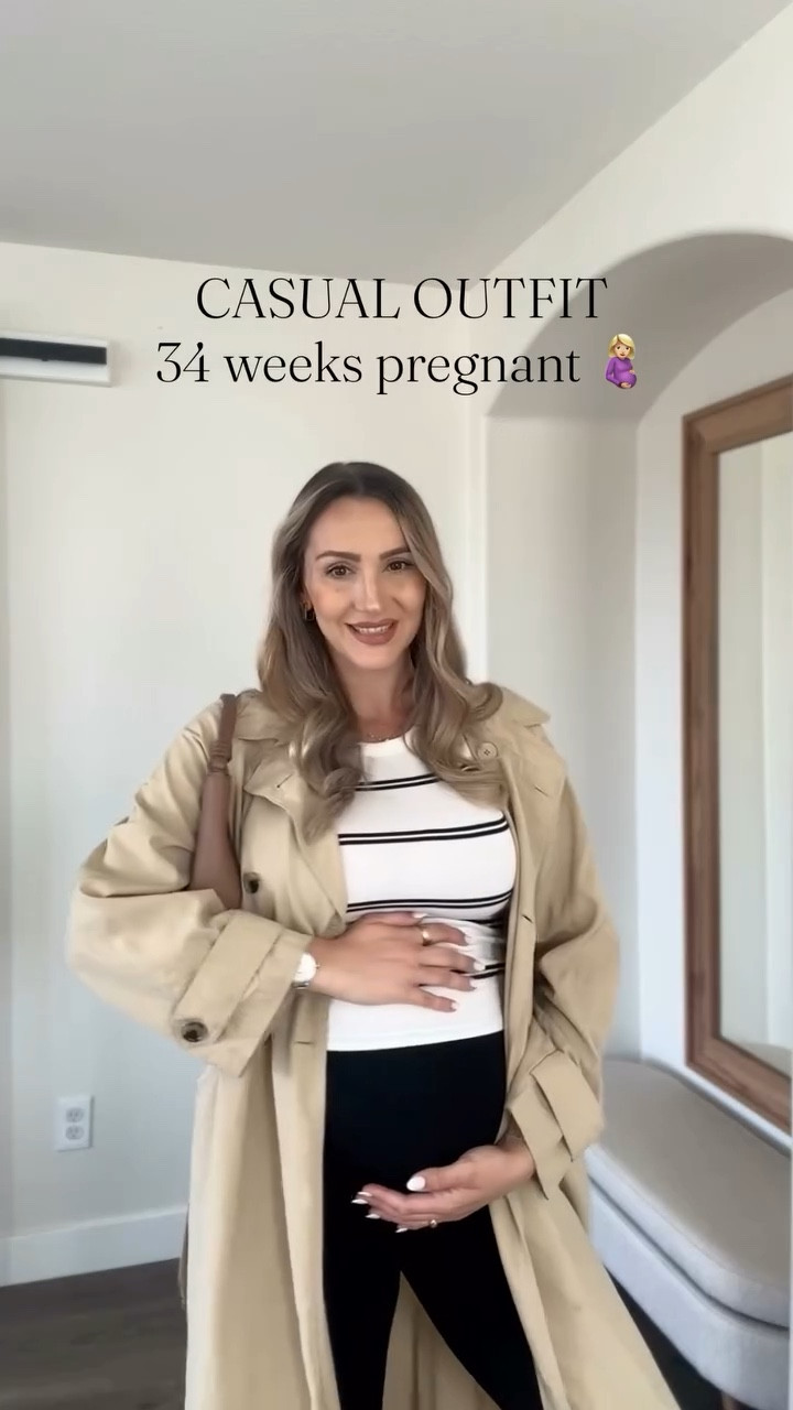 34 weeks pregnant and still finding ways to feel like myself 🤍
Pregnancy style doesn’t have to mean sacrificing comfort or confidence. As a mom chasing a toddler while growing a baby, I need outfits that work with me, not against me.

This is one of my go-to formulas lately:
simple black pants + a striped top + an oversized blazers/trench + a structured bag = effortless, elevated, and bump-friendly.

It’s comfy enough for real life, but still makes me feel put together in seconds. Because motherhood is busy, but you still deserve to feel beautiful in your own skin.

Saving these easy outfit formulas has been a game changer during this pregnancy. You don’t need a whole new wardrobe. Just intentional pieces that grow with you.

Growing a baby, raising a baby, and still showing up as me. That’s the season I’m in 🤍

OUTFIT DETAILS:
PANTS: @lauren.vidal 
TOP: @bananarepublic 
TRENCH: @mango @mango.outfits 
BAG: @mango 
SHOES: @adidas 

#pregnancystyle #34weekspregnant #maternitystyle #pregnancyoutfit #momstyle 

#LTKBump #LTKmomlife #LTKootd