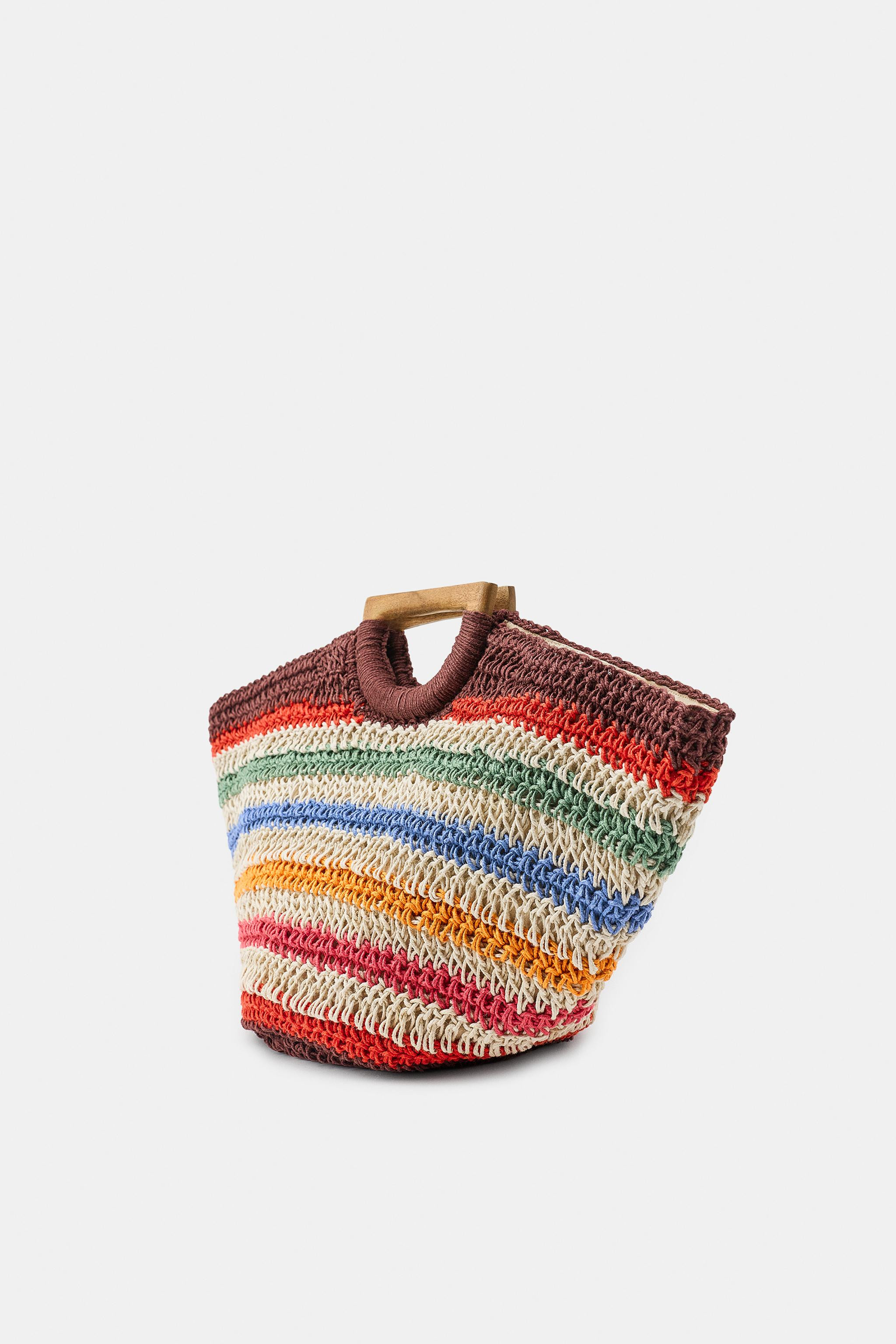 Model height: 176 cmTote-style basket bag with a main body made from 100% jute. Wooden top handle... | Zara UK