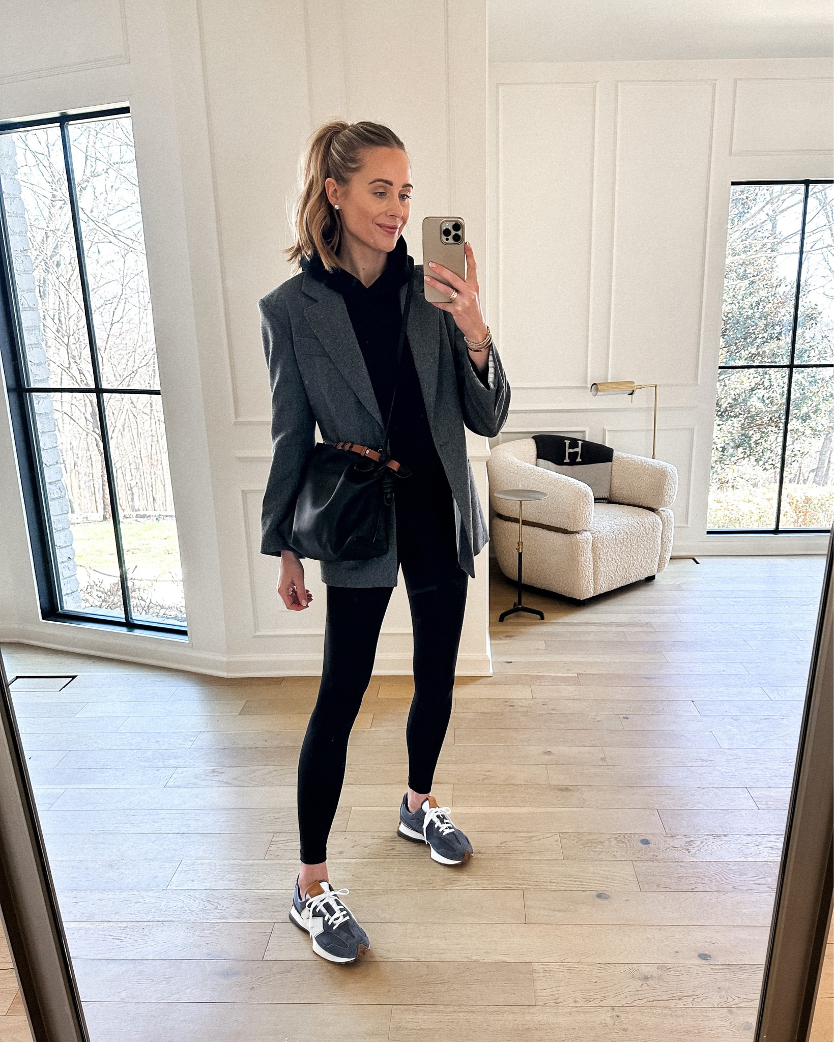 Fashion Jackson wearing grey blazer (medium for oversized fit), black hoodie (small), lululemon black leggings, new balance sneakers (tts) athleisure outfit #fashionjackson #dailylook #sneakers #leggings 

#LTKunder100 #LTKshoecrush #LTKstyletip