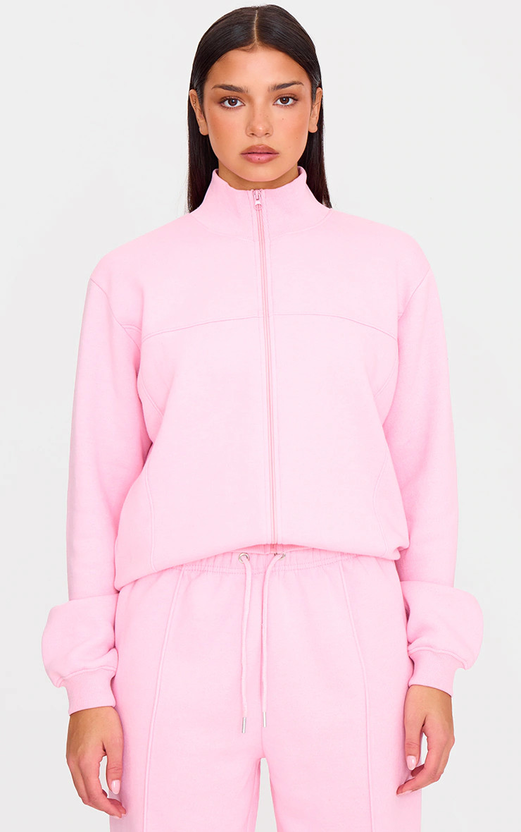 Baby Pink Seam Detail Zip Through High Neck Sweatshirt | PrettyLittleThing UK