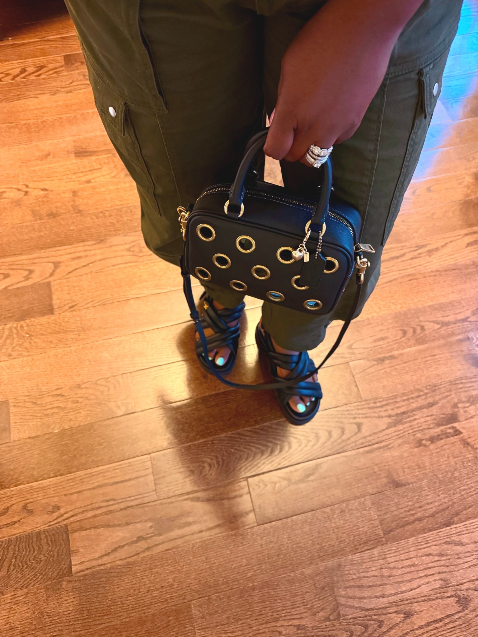 Perfect translation from Summer to Fall!! I love these MCM sandals, coach outlet bag and Walmart cargo pants. 

#LTKSaleAlert #LTKSeasonal #LTKOver40