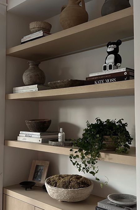 #shelfie #shelfdecor #coffeetablebooks #vintage #artisan #vase #travertine #catchall #indoorplant 

#LTKhome #LTKstyletip #LTKFind