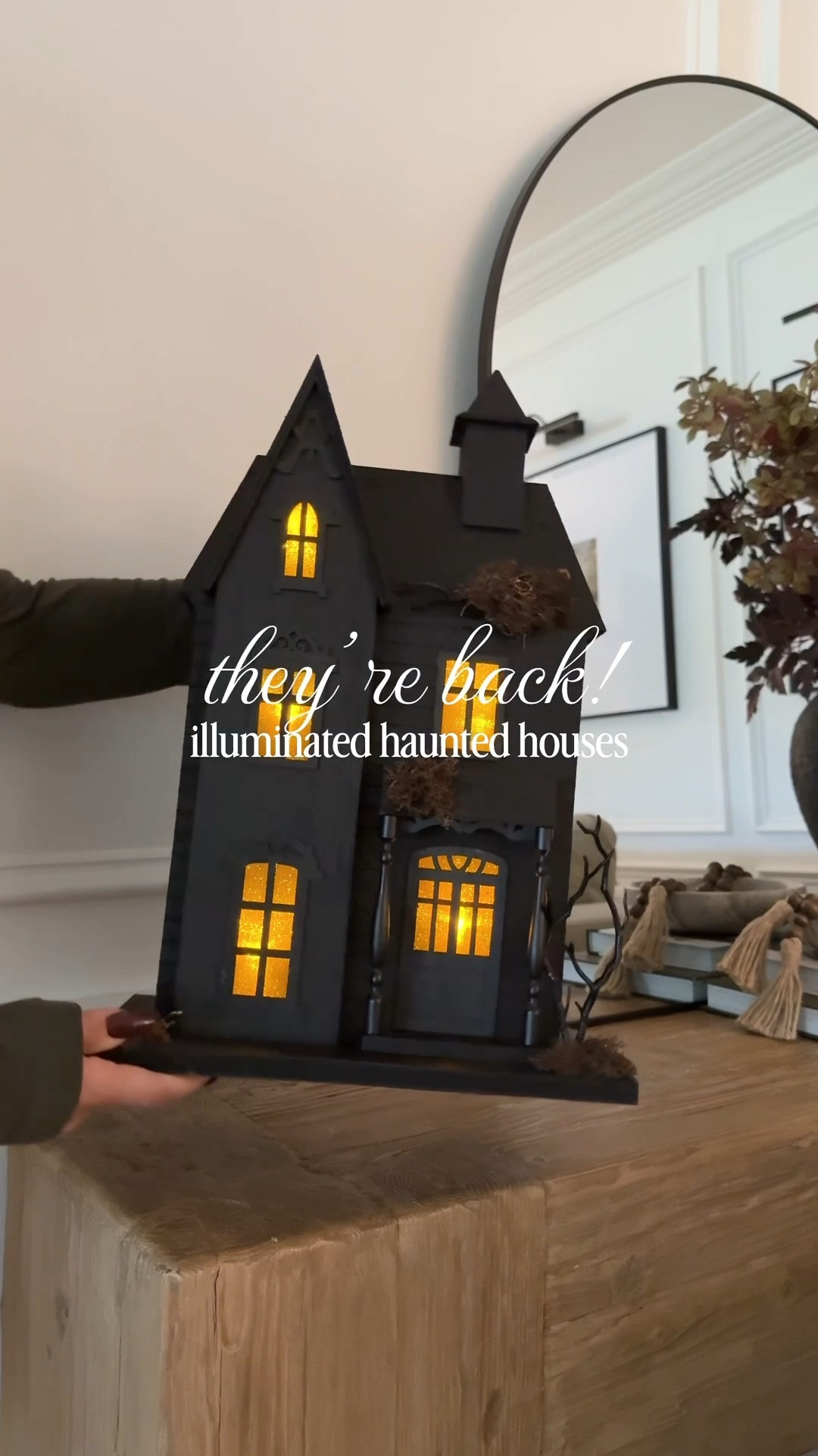 They’re back for the 2026! There’s some slight variations, but this is one of my favorite purchases from @Target 

These wooden haunted houses come in a few few sizes and illuminate with the touch of a button. Ordering tip: I ordered mine online last year for local pick up to avoid possible damage during shipping. 🖤

#LTKSeasonal #LTKHome #LTKSaleAlert